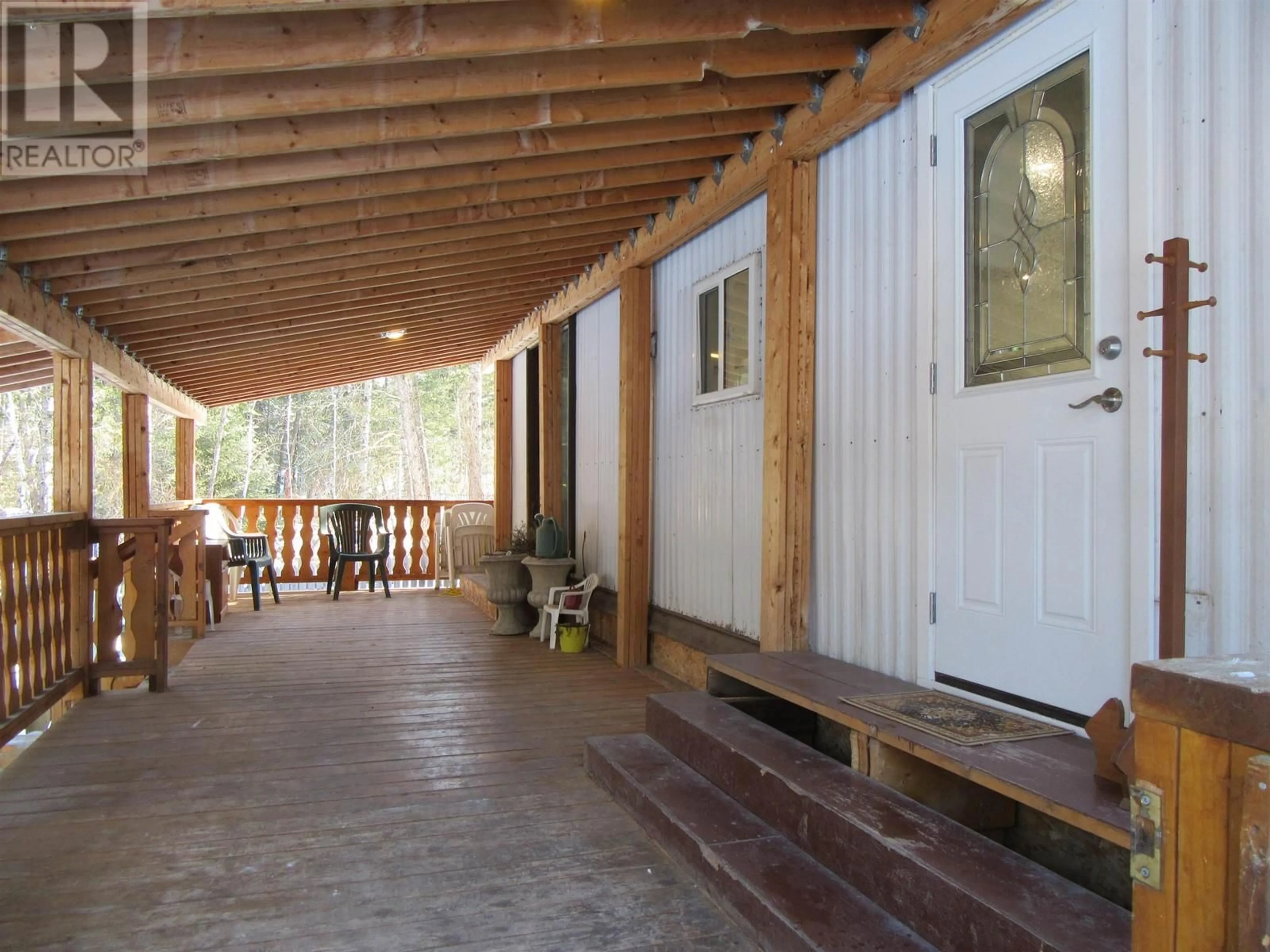 Patio, unknown for 5484 SAUNDERS CRESCENT, 103 Mile House British Columbia V0K2E1