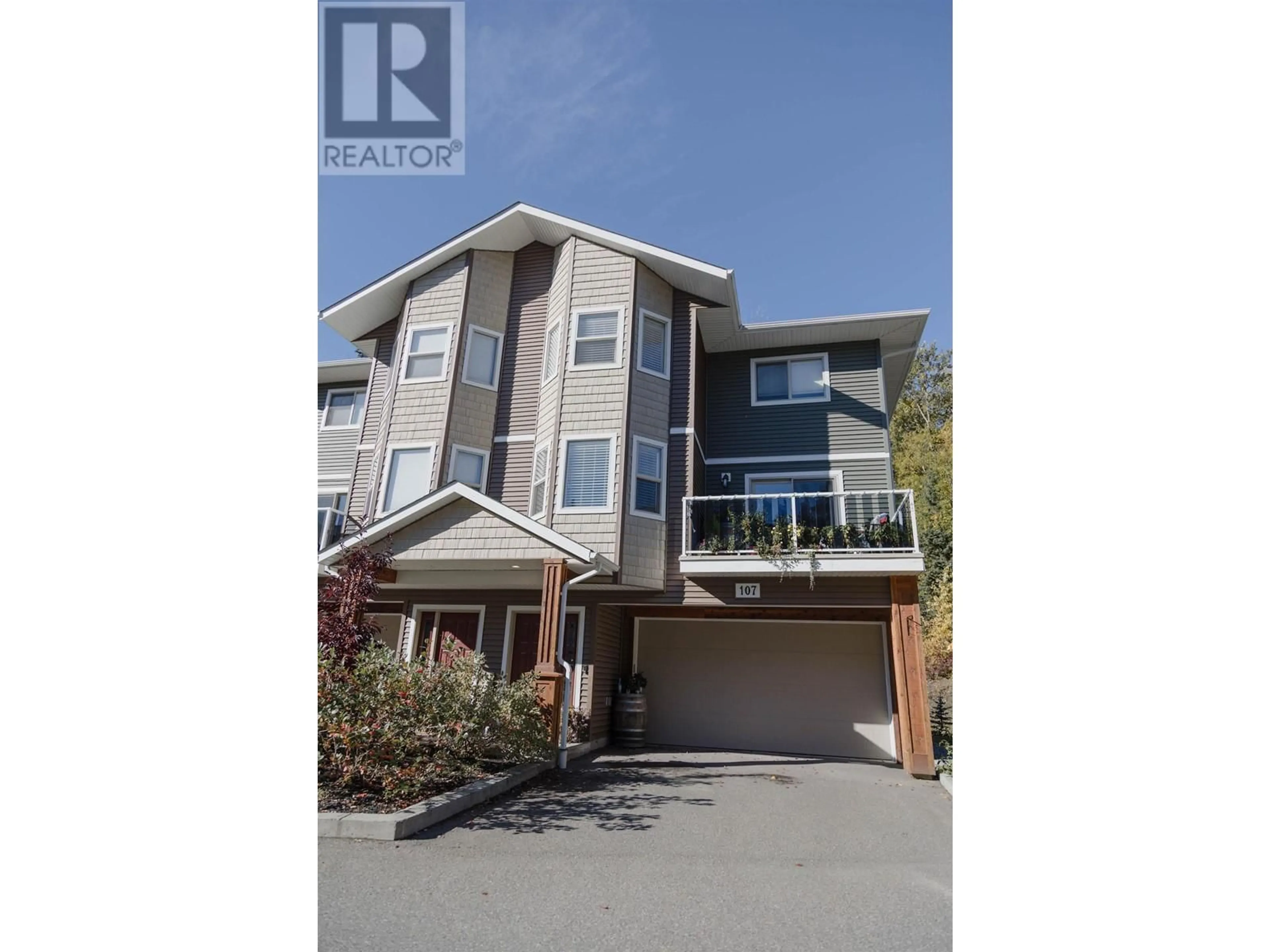 A pic from outside/outdoor area/front of a property/back of a property/a pic from drone, street for 107 7400 CREEKSIDE WAY, Prince George British Columbia V2N0G6