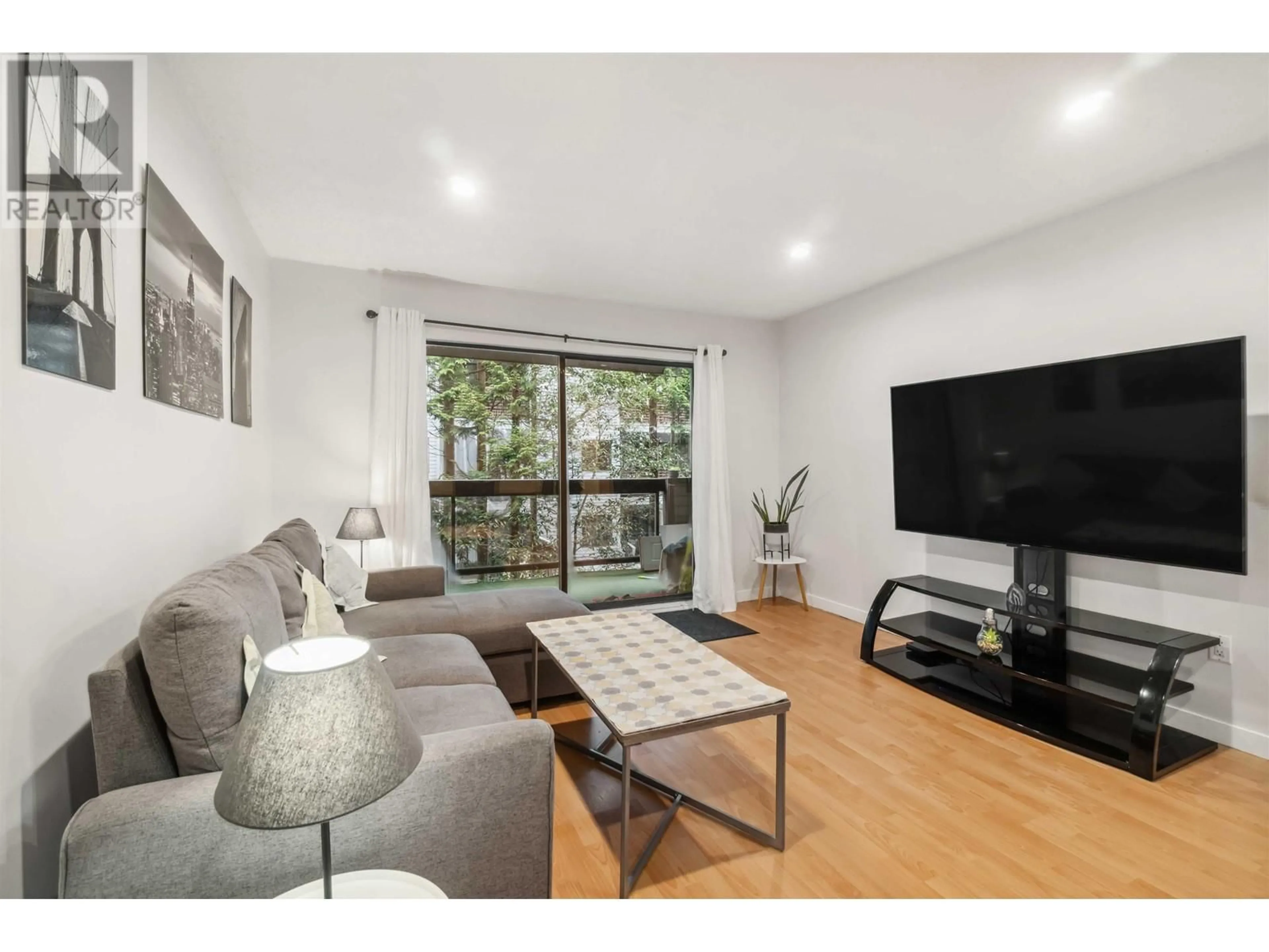 Living room with furniture, wood/laminate floor for 203 6105 KINGSWAY, Burnaby British Columbia V5J5C7