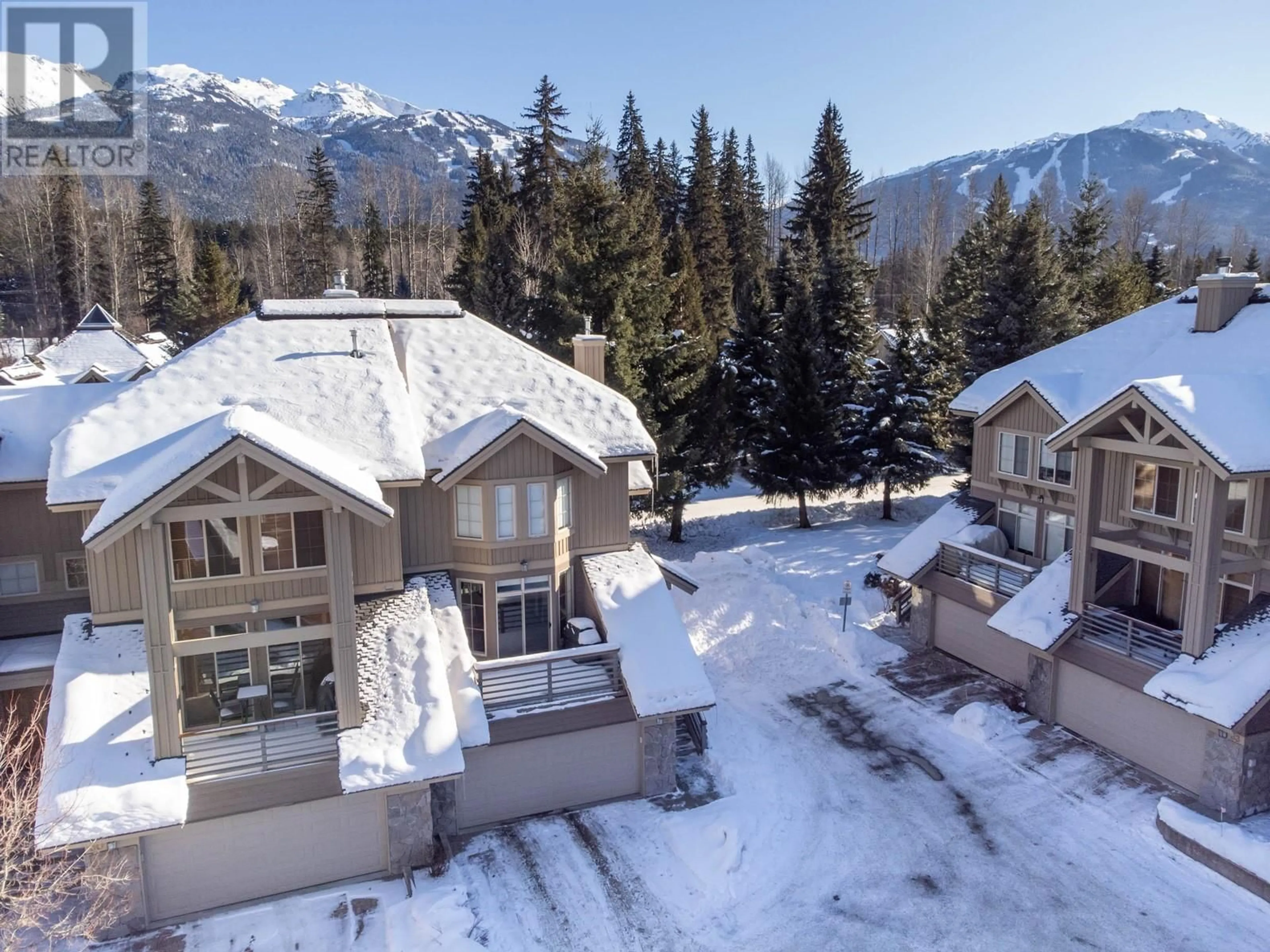 A pic from outside/outdoor area/front of a property/back of a property/a pic from drone, mountain view for 31 8030 NICKLAUS NORTH BOULEVARD, Whistler British Columbia V8E1J7