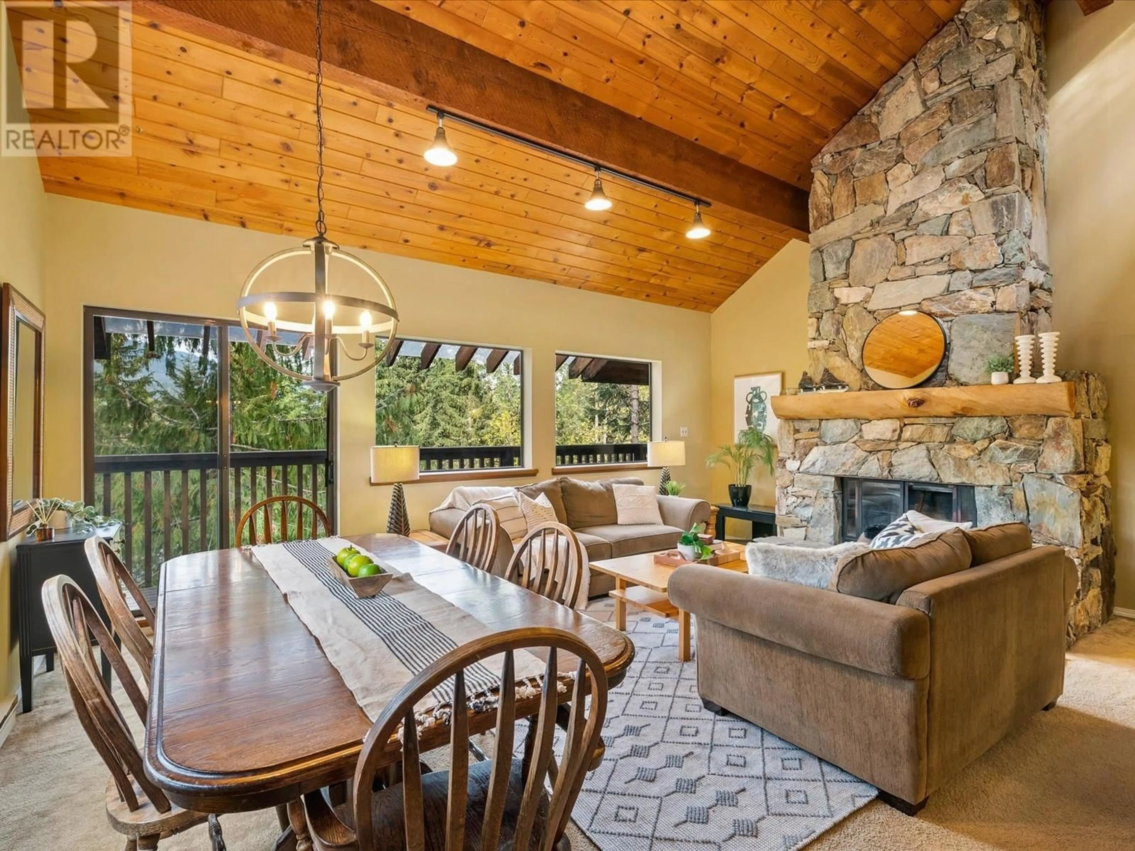 Living room with furniture, wood/laminate floor for 2317 CHEAKAMUS WAY, Whistler British Columbia V8E0A8