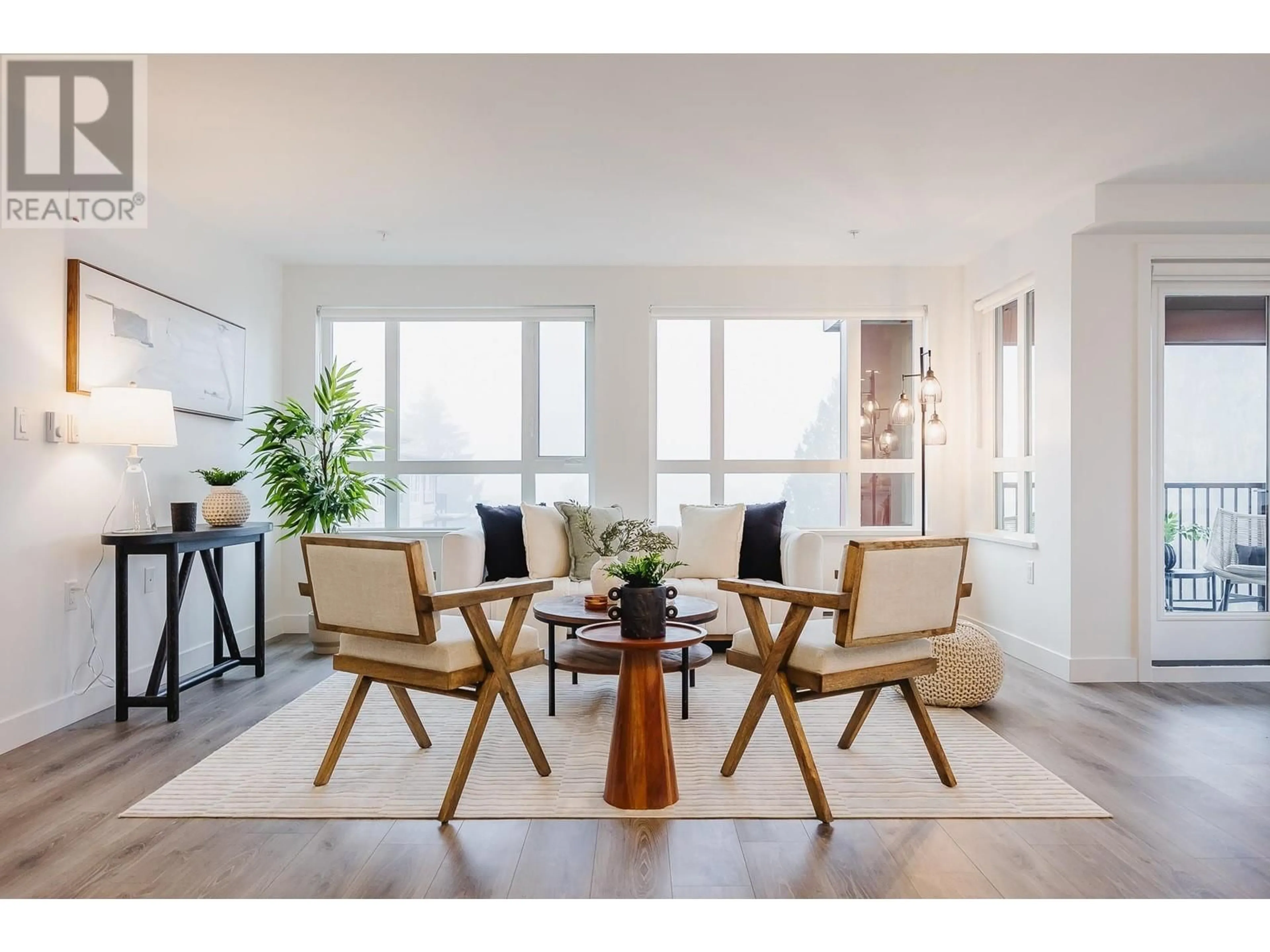 Living room with furniture, wood/laminate floor for 407 22575 BROWN AVENUE, Maple Ridge British Columbia V2X6W2