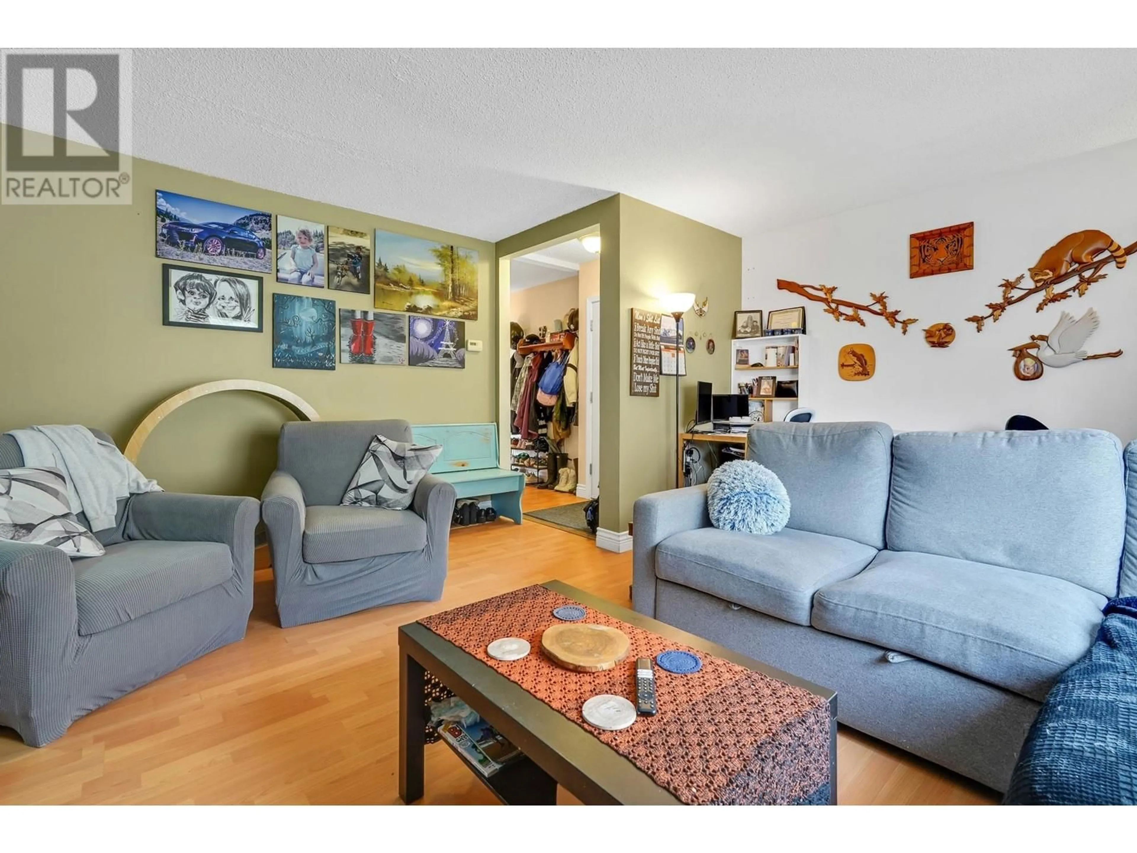 Living room with furniture, wood/laminate floor for 11329 207TH STREET, Maple Ridge British Columbia V2X1W4