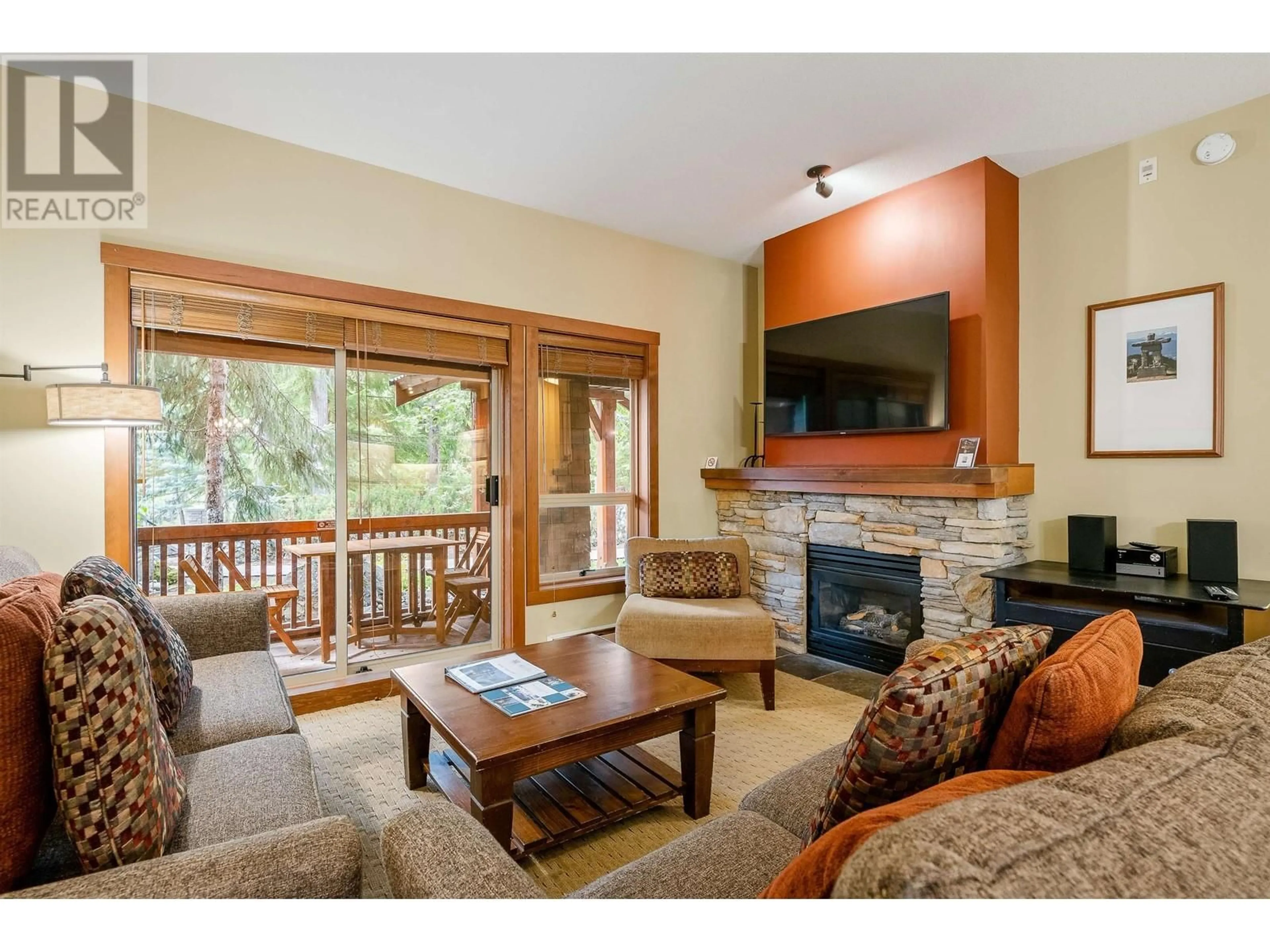 Living room with furniture, wood/laminate floor for 104(G4) 4653 BLACKCOMB WAY, Whistler British Columbia V8E0Y9