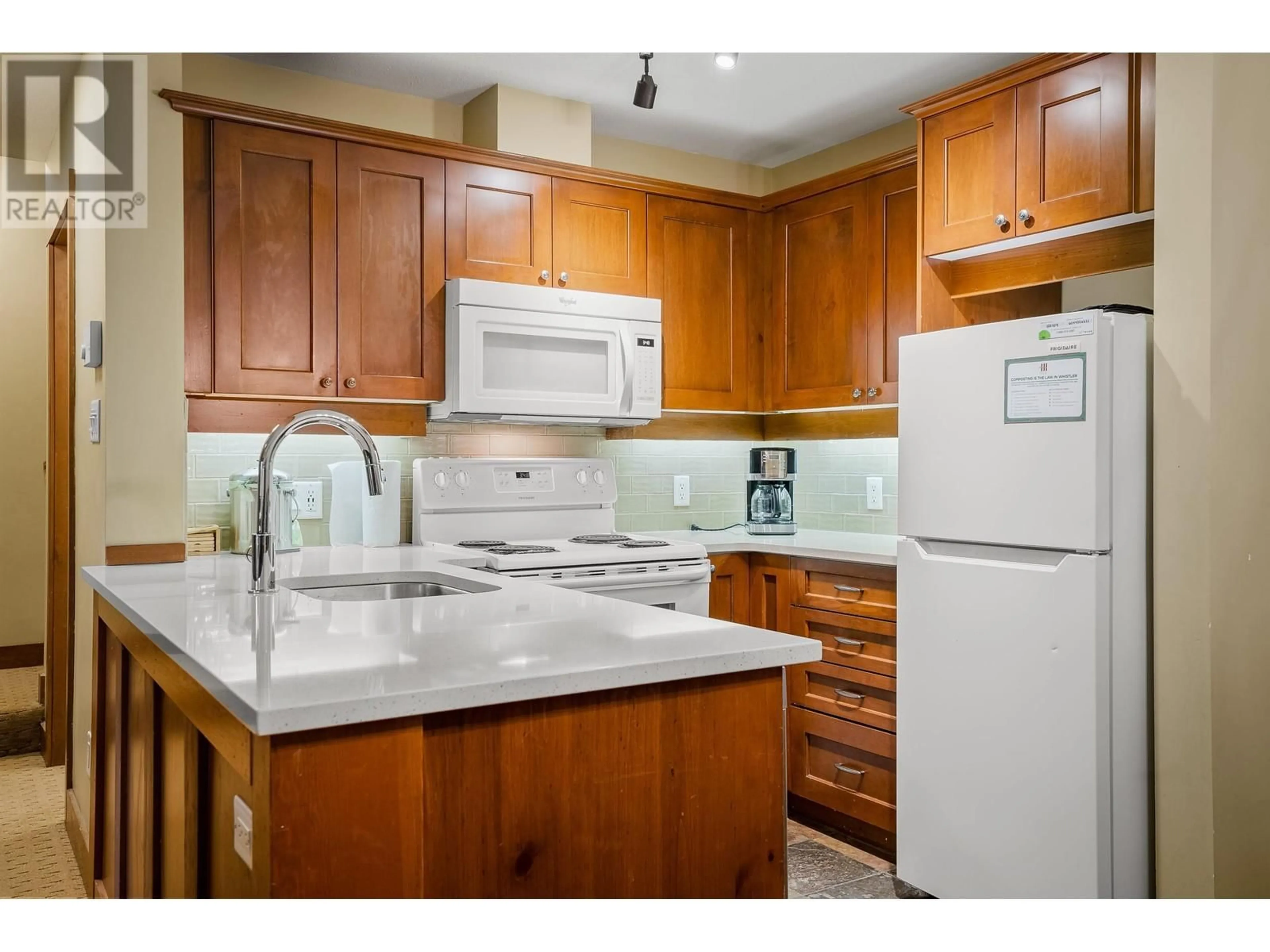 Standard kitchen, ceramic/tile floor for 104(G4) 4653 BLACKCOMB WAY, Whistler British Columbia V8E0Y9