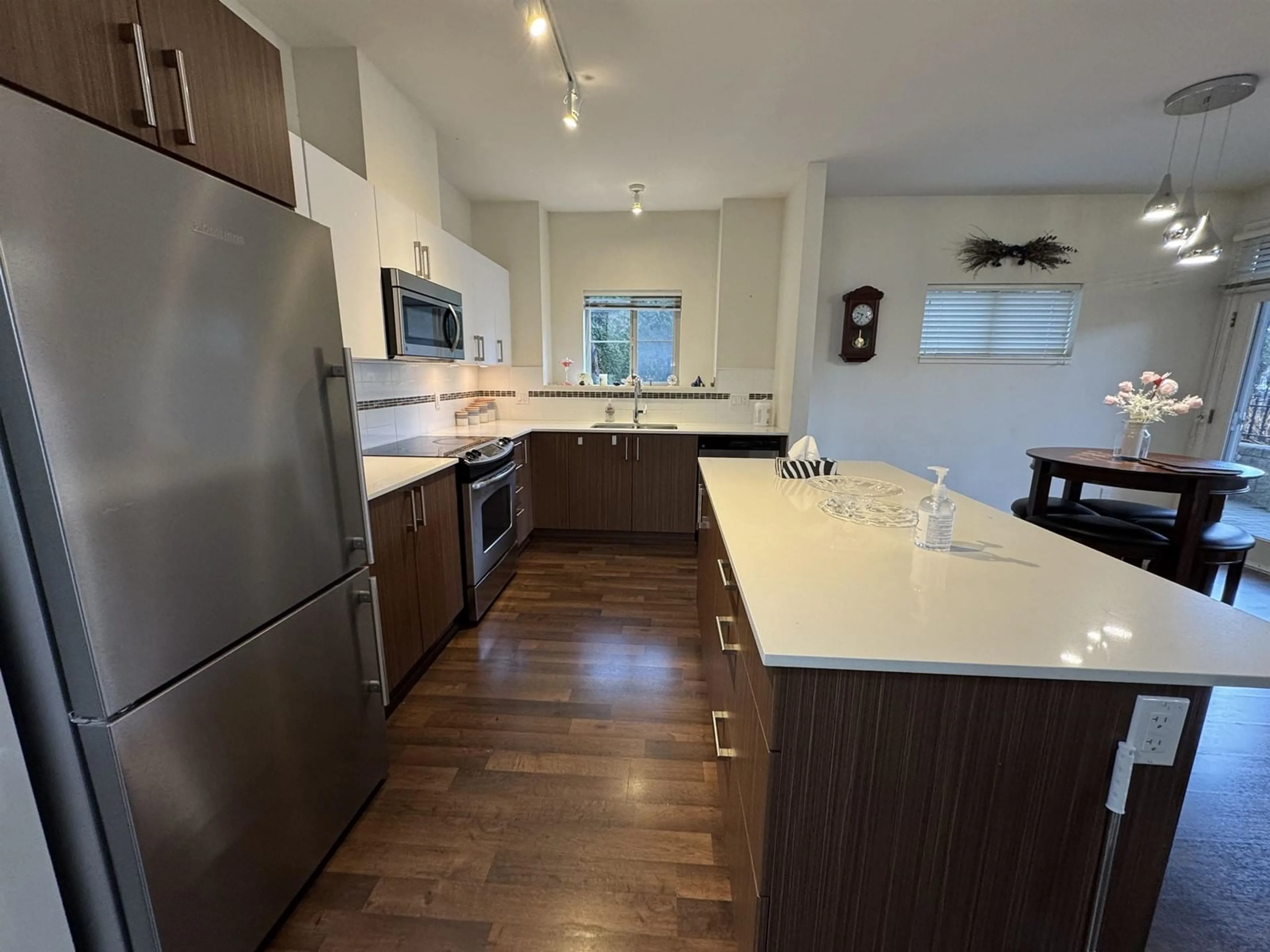 Open concept kitchen, unknown for 101 8733 160 STREET, Surrey British Columbia V4N6P9