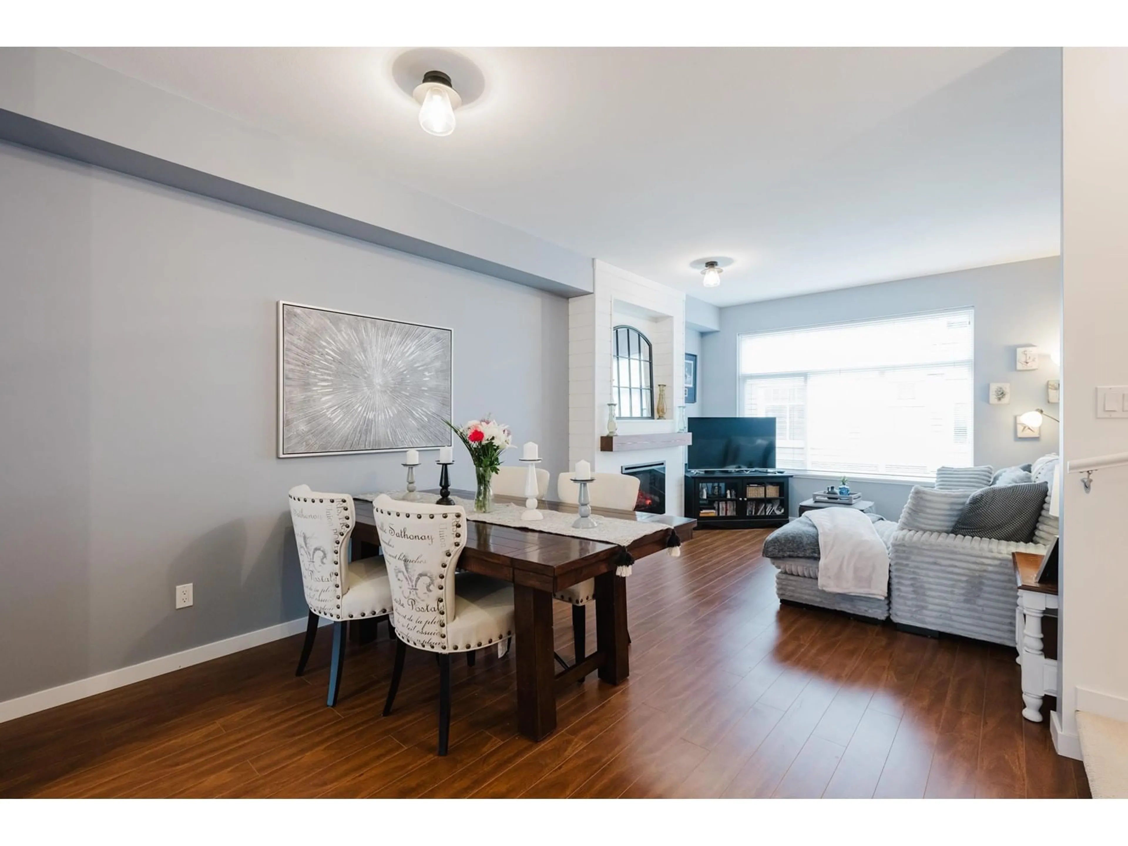 Living room with furniture, wood/laminate floor for 21 14356 63A AVENUE, Surrey British Columbia V3X0E3