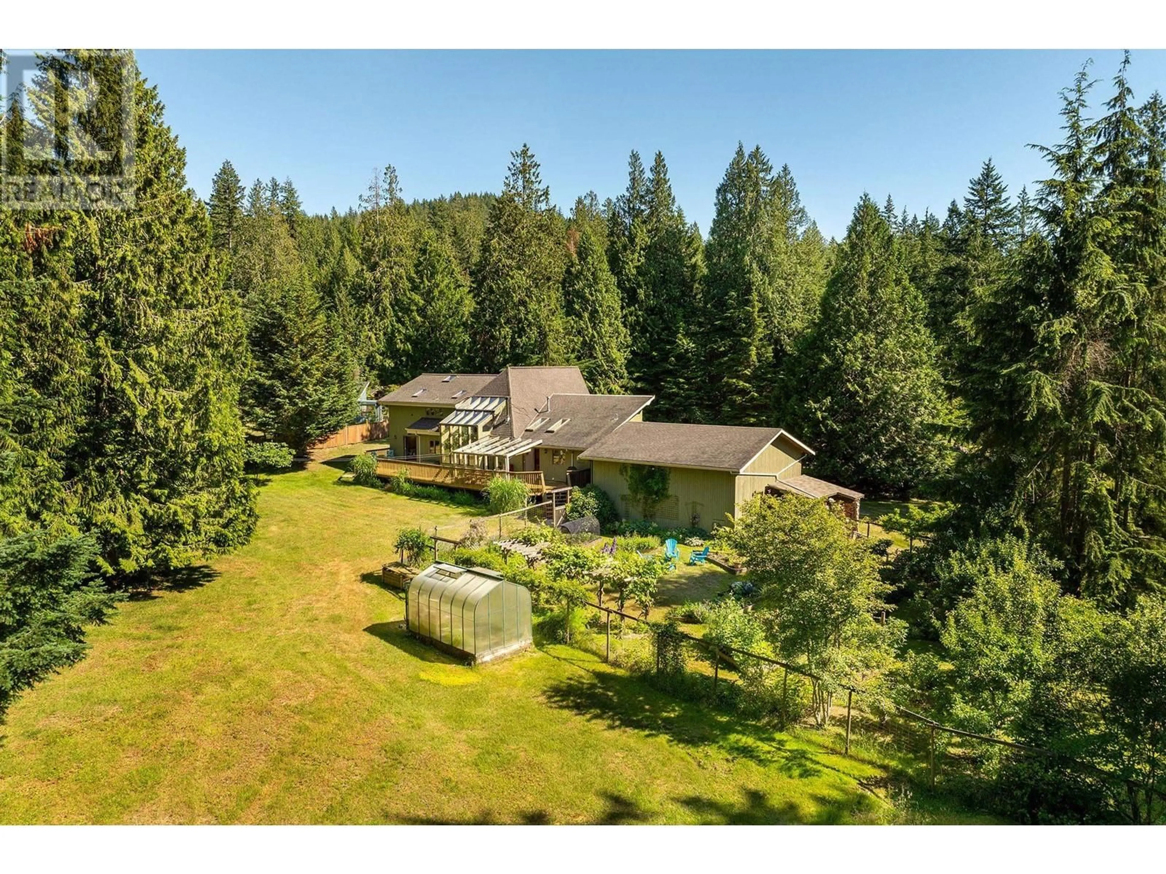 A pic from outside/outdoor area/front of a property/back of a property/a pic from drone, forest/trees view for 1532 ADAMS ROAD, Bowen Island British Columbia V0N1G2