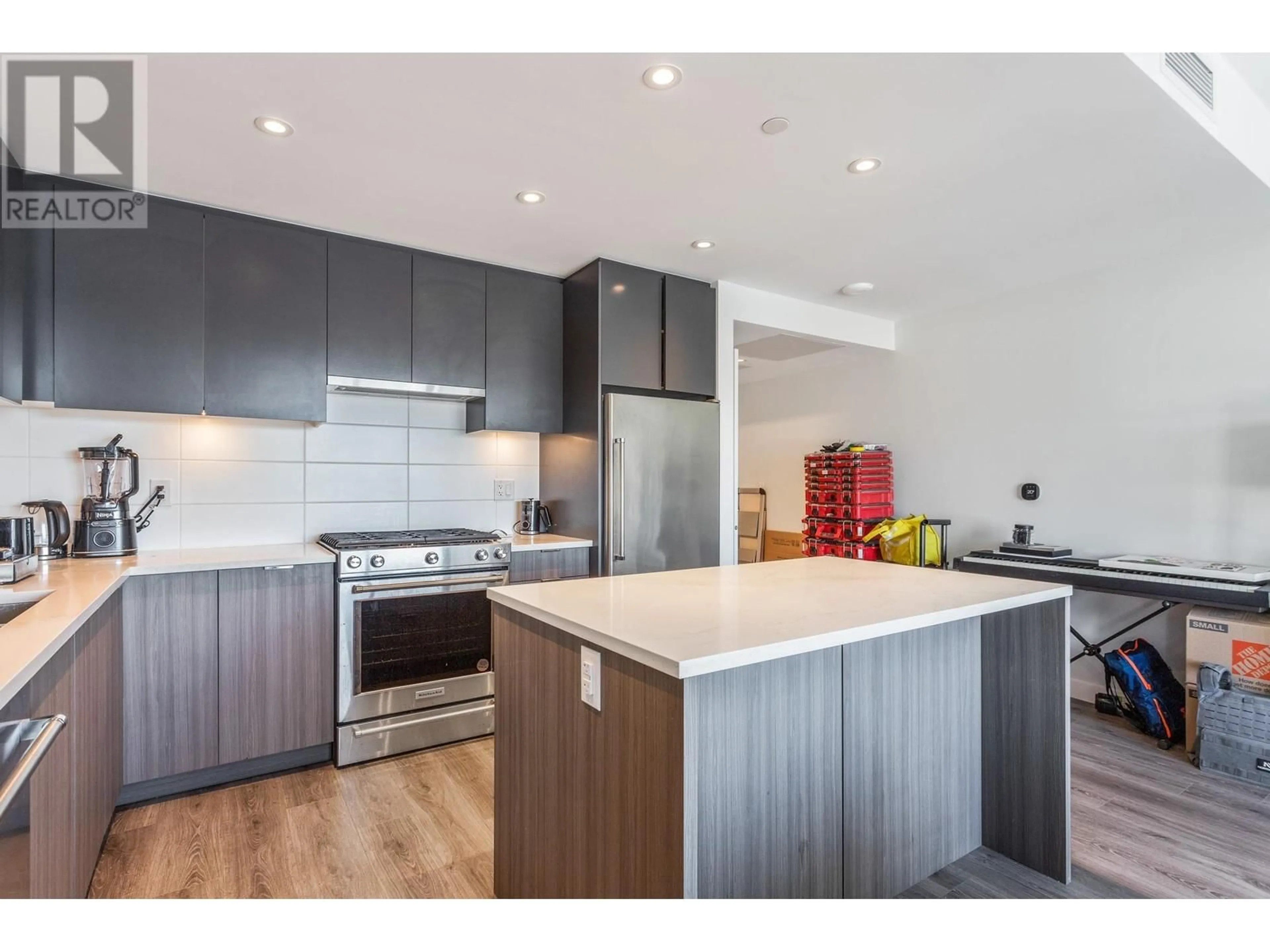 Open concept kitchen, wood/laminate floor for 513 3430 E KENT AVENUE SOUTH, Vancouver British Columbia V5S0G7