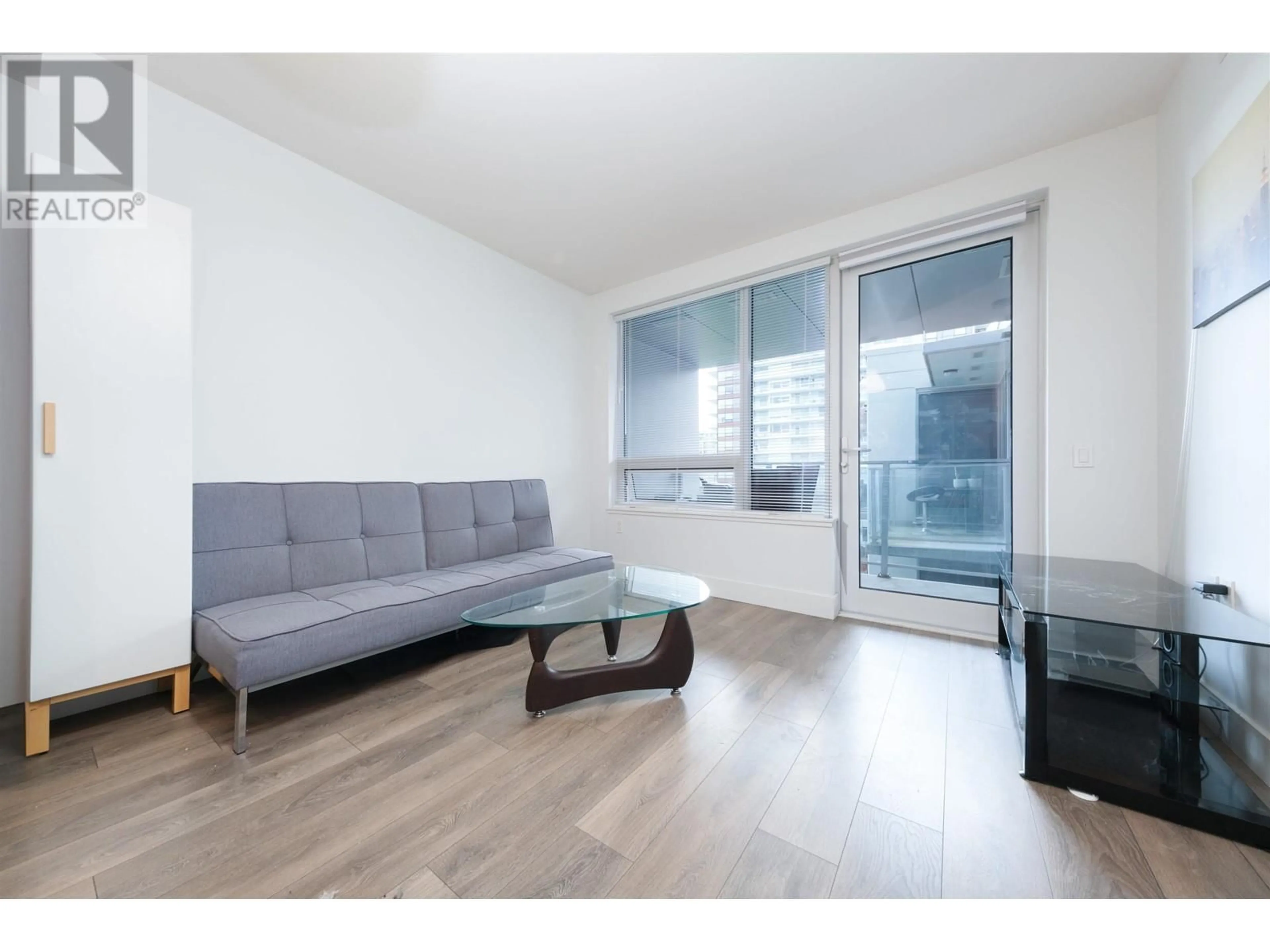 Living room with furniture, wood/laminate floor for 628 - 5233 GILBERT ROAD, Richmond British Columbia V7C0B3