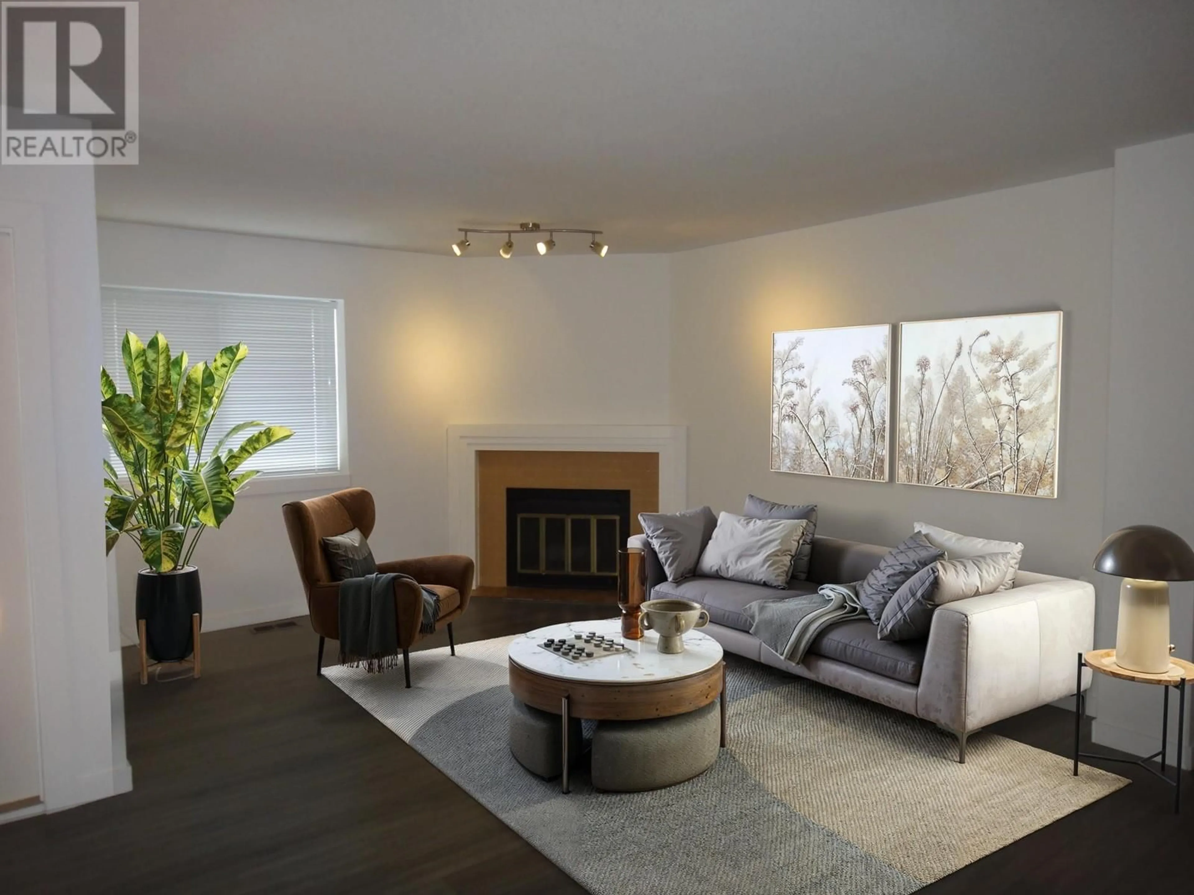 Living room with furniture, wood/laminate floor for 8490 FRENCH STREET, Vancouver British Columbia V6P4W2