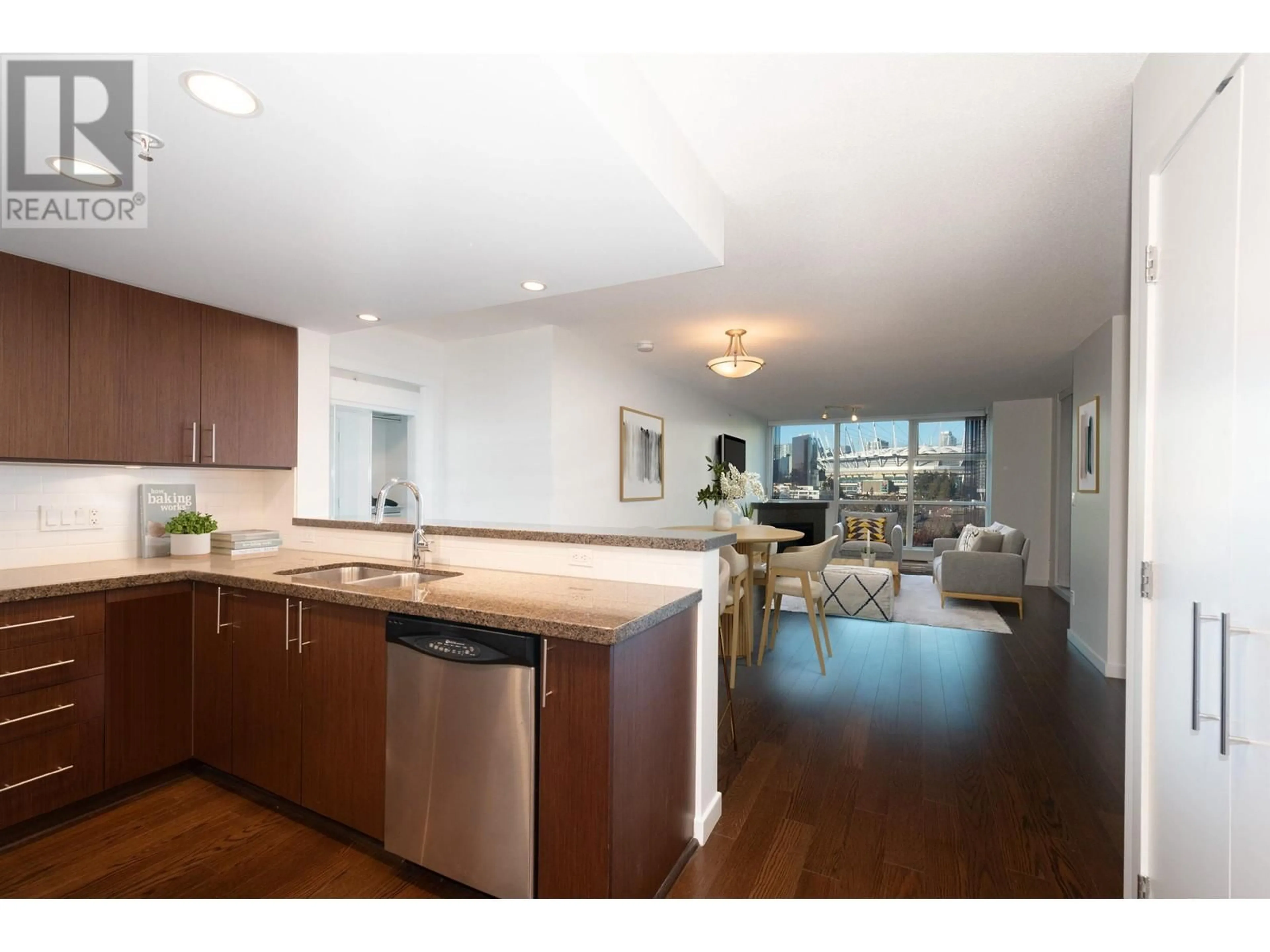 Open concept kitchen, wood/laminate floor for 506 125 MILROSS AVENUE, Vancouver British Columbia V6A0A1