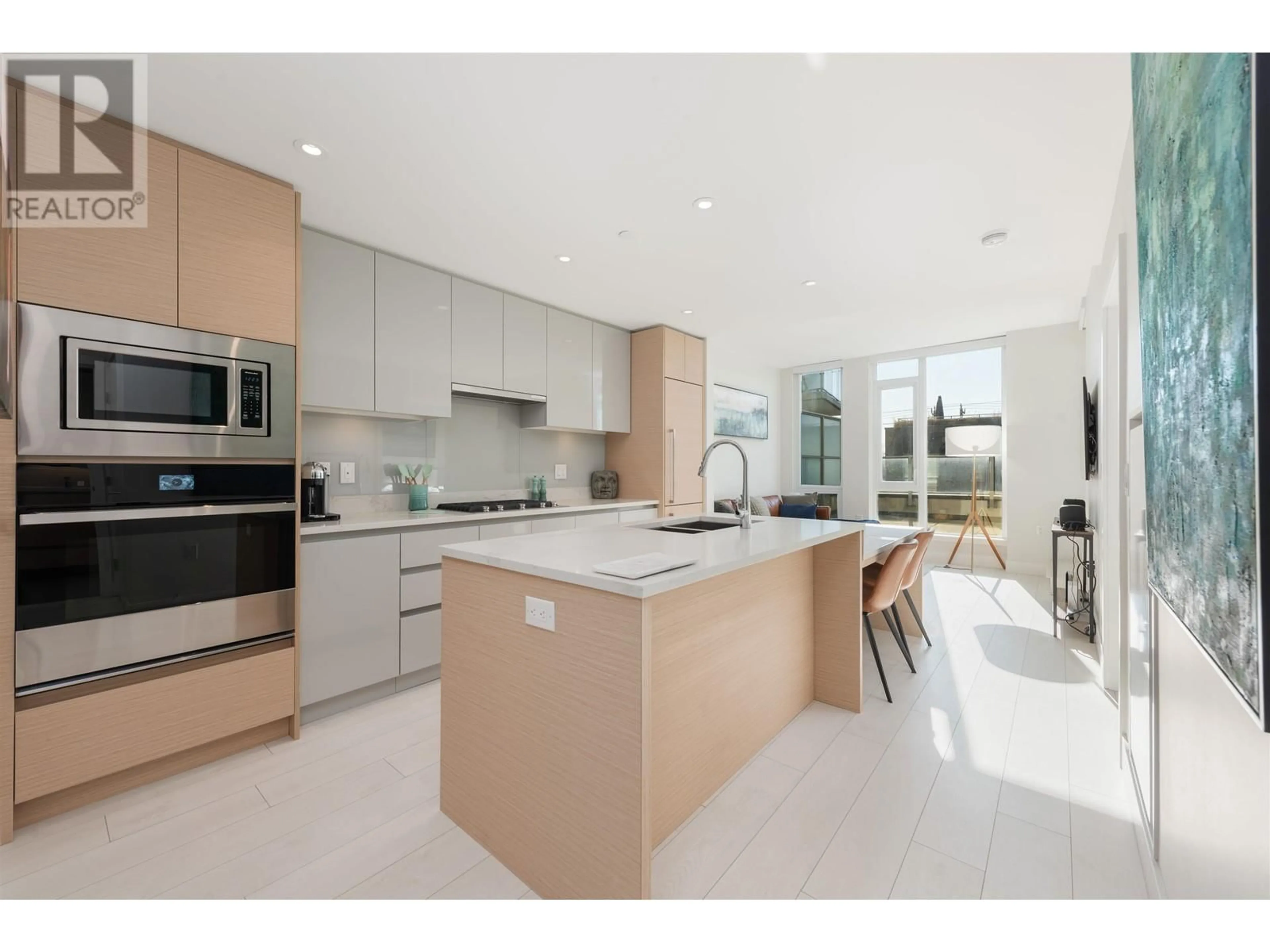 Open concept kitchen, ceramic/tile floor for 302 3538 SAWMILL CRESCENT, Vancouver British Columbia V5S0J8