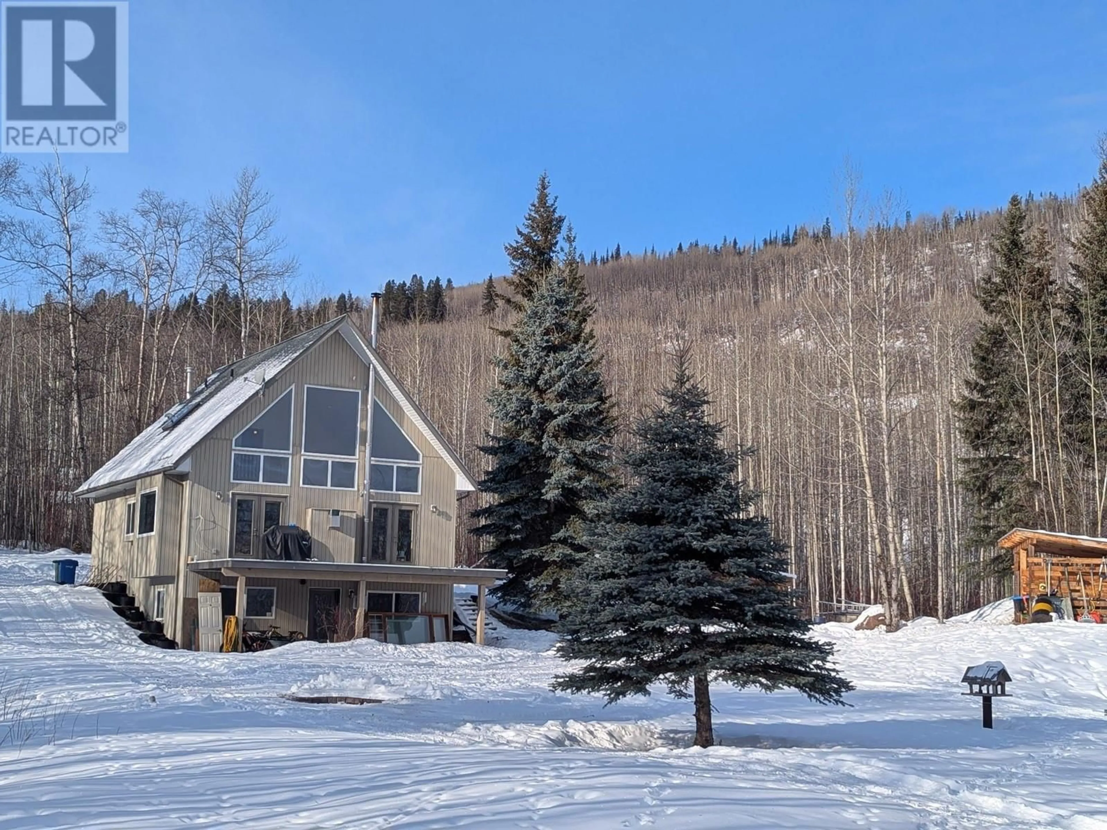 A pic from outside/outdoor area/front of a property/back of a property/a pic from drone, mountain view for 4383 E QUAIL DRIVE, Smithers British Columbia V0J2N4