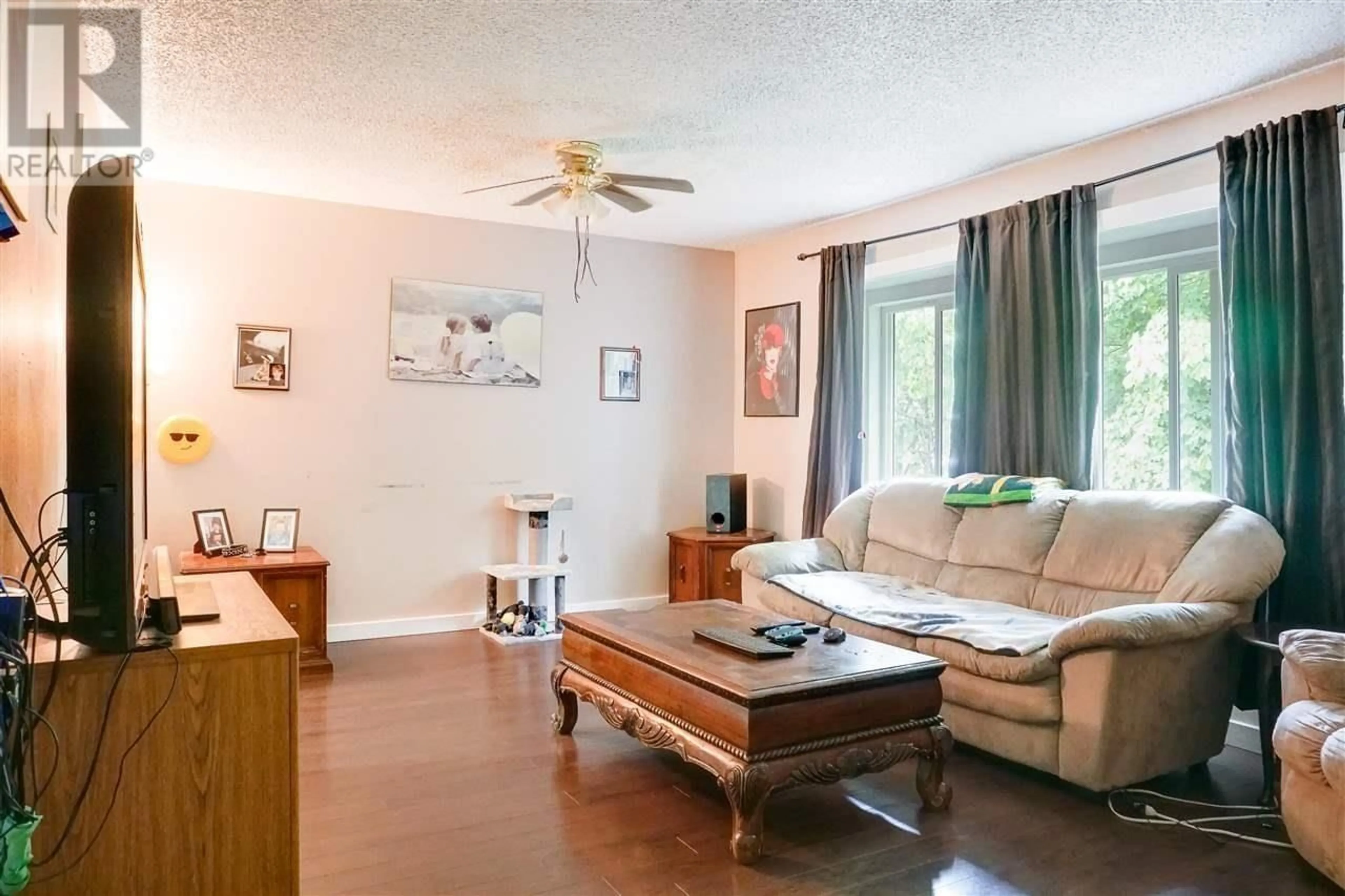 Living room with furniture, wood/laminate floor for 91 ORIOLE STREET, Kitimat British Columbia V8C1M6