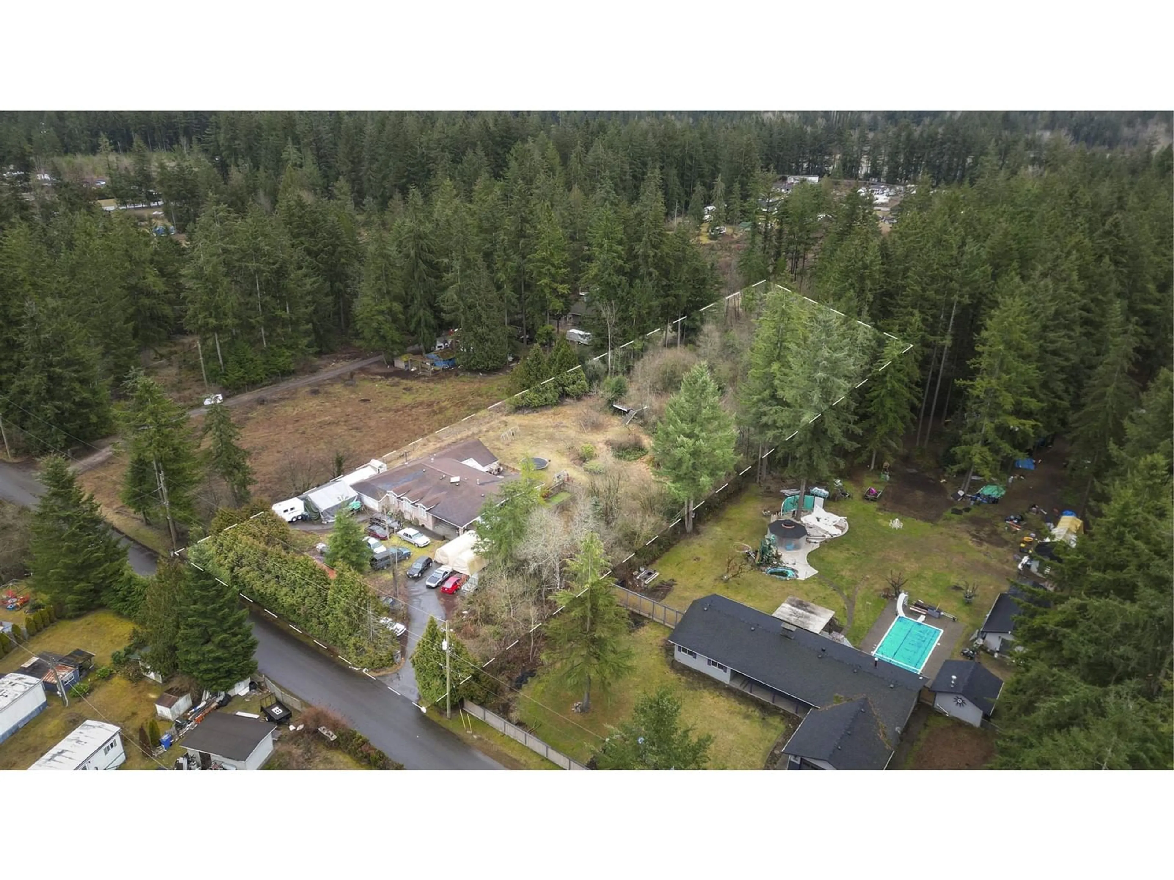 A pic from outside/outdoor area/front of a property/back of a property/a pic from drone, forest/trees view for 19840 30 AVENUE, Langley British Columbia V2Z1Y1