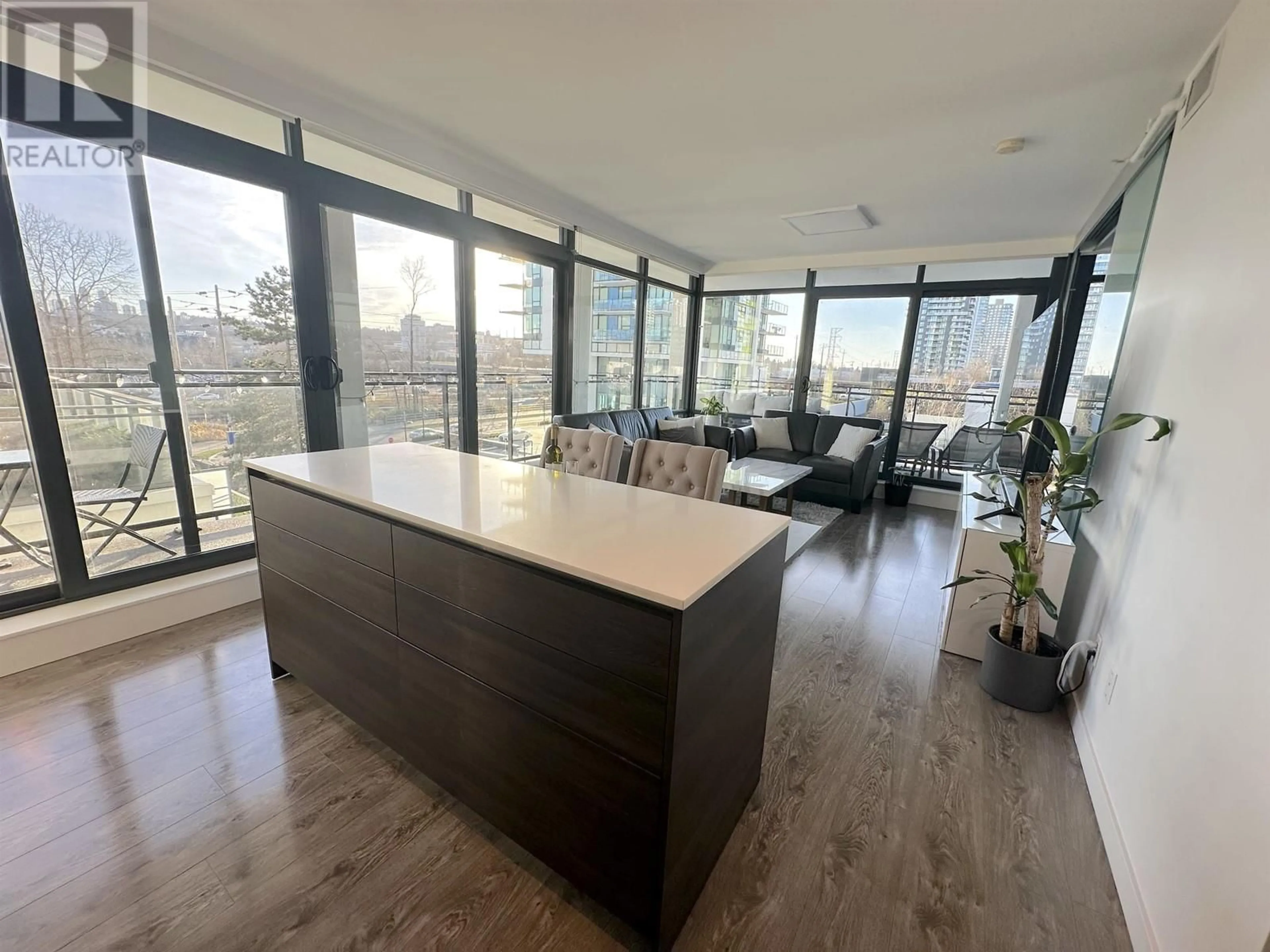 Open concept kitchen, wood/laminate floor for 406 - 2378 ALPHA AVENUE, Burnaby British Columbia V5C0K2