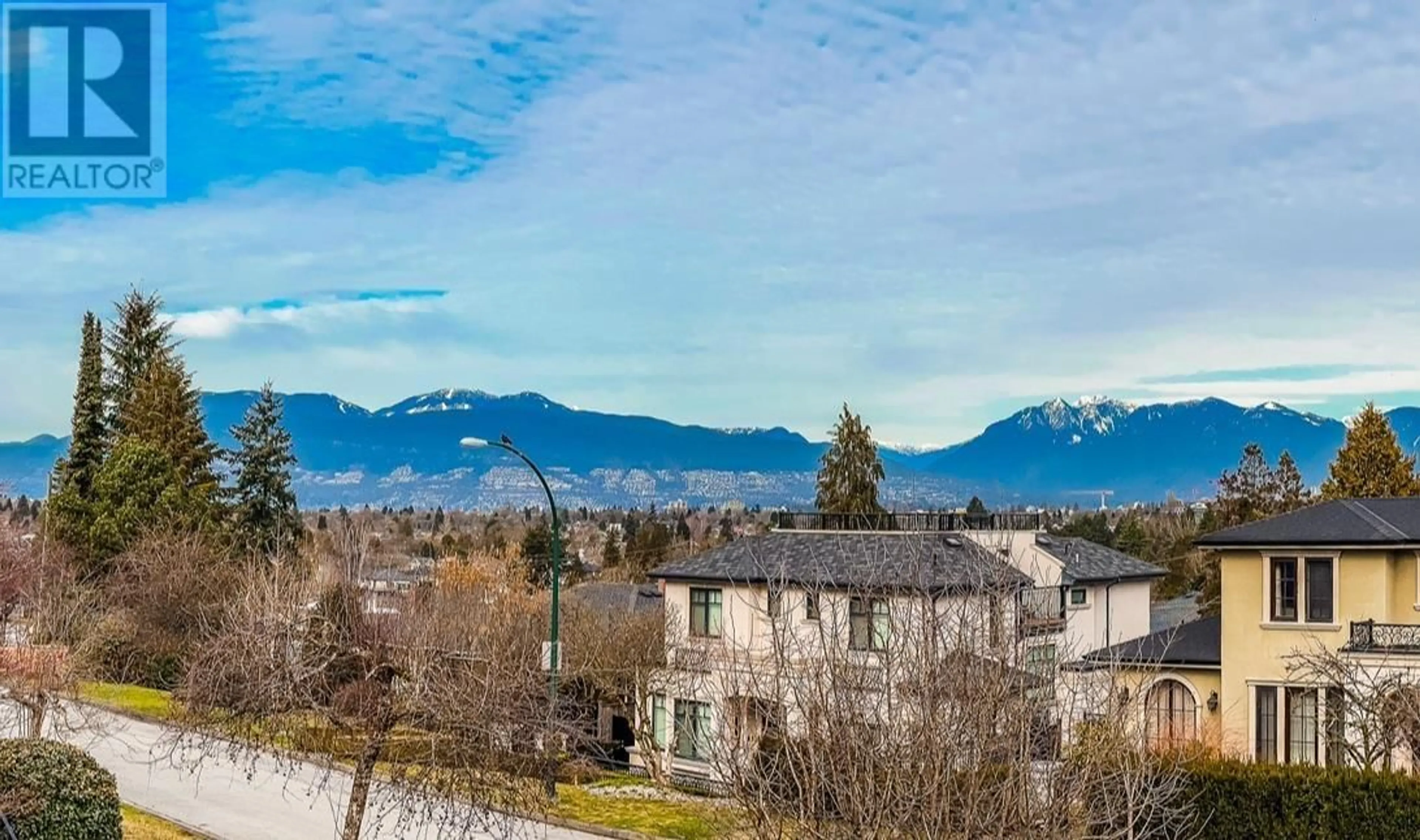 A pic from outside/outdoor area/front of a property/back of a property/a pic from drone, mountain view for 4807 PATON STREET, Vancouver British Columbia V6L2H9