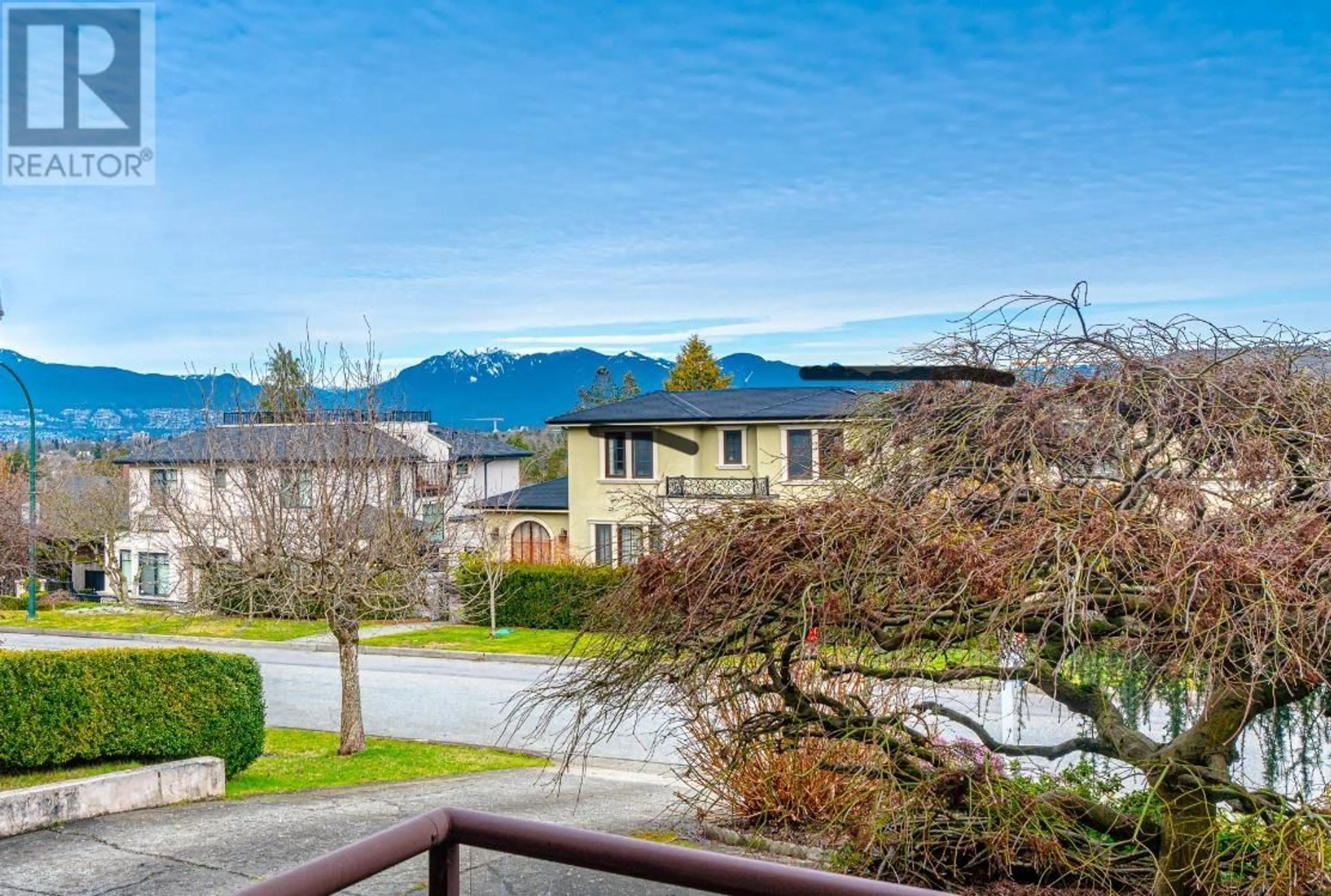 A pic from outside/outdoor area/front of a property/back of a property/a pic from drone, mountain view for 4807 PATON STREET, Vancouver British Columbia V6L2H9