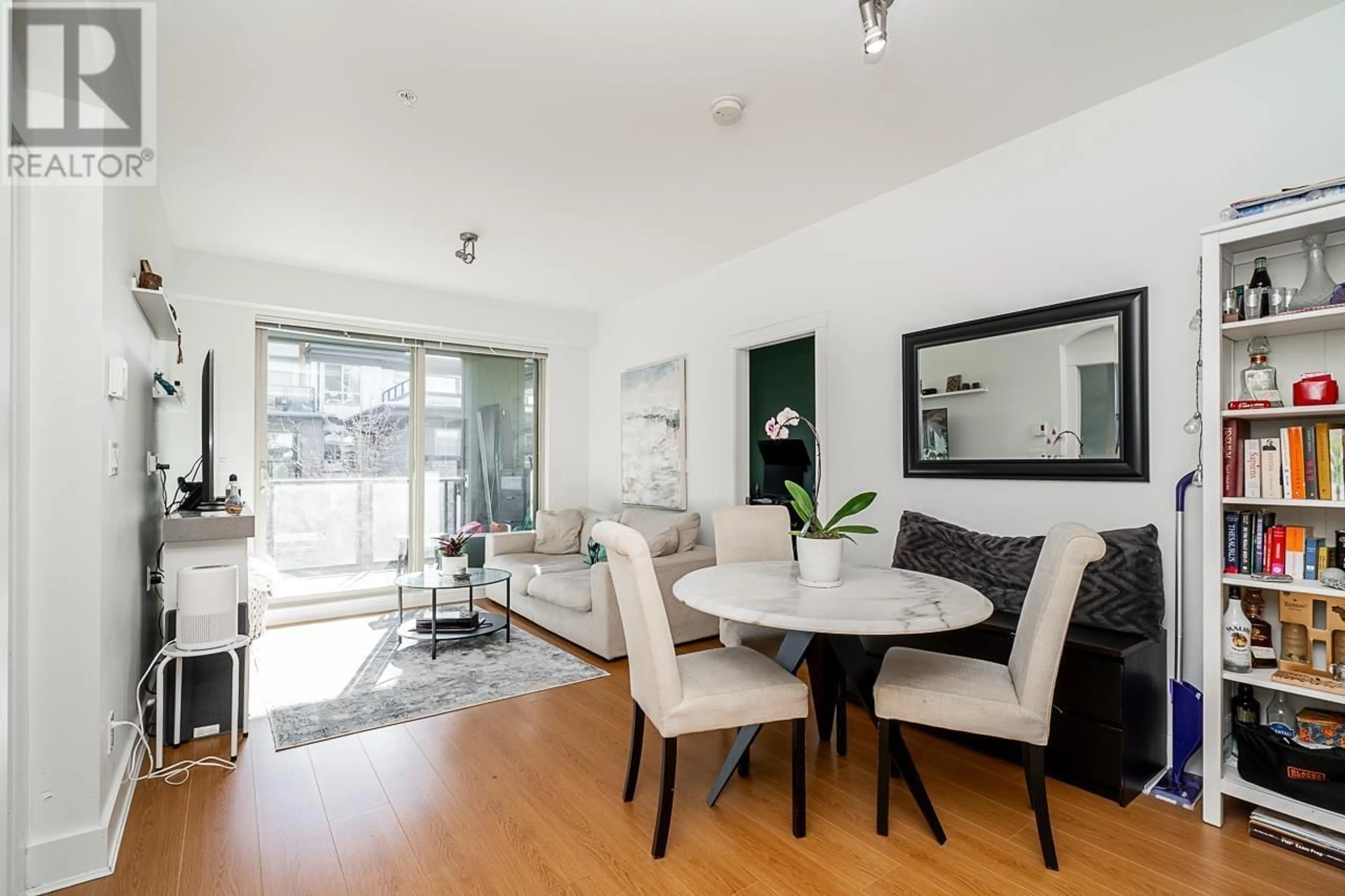 Dining room, wood/laminate floor for 316 7418 BYRNEPARK WALK, Burnaby British Columbia V3N0B3