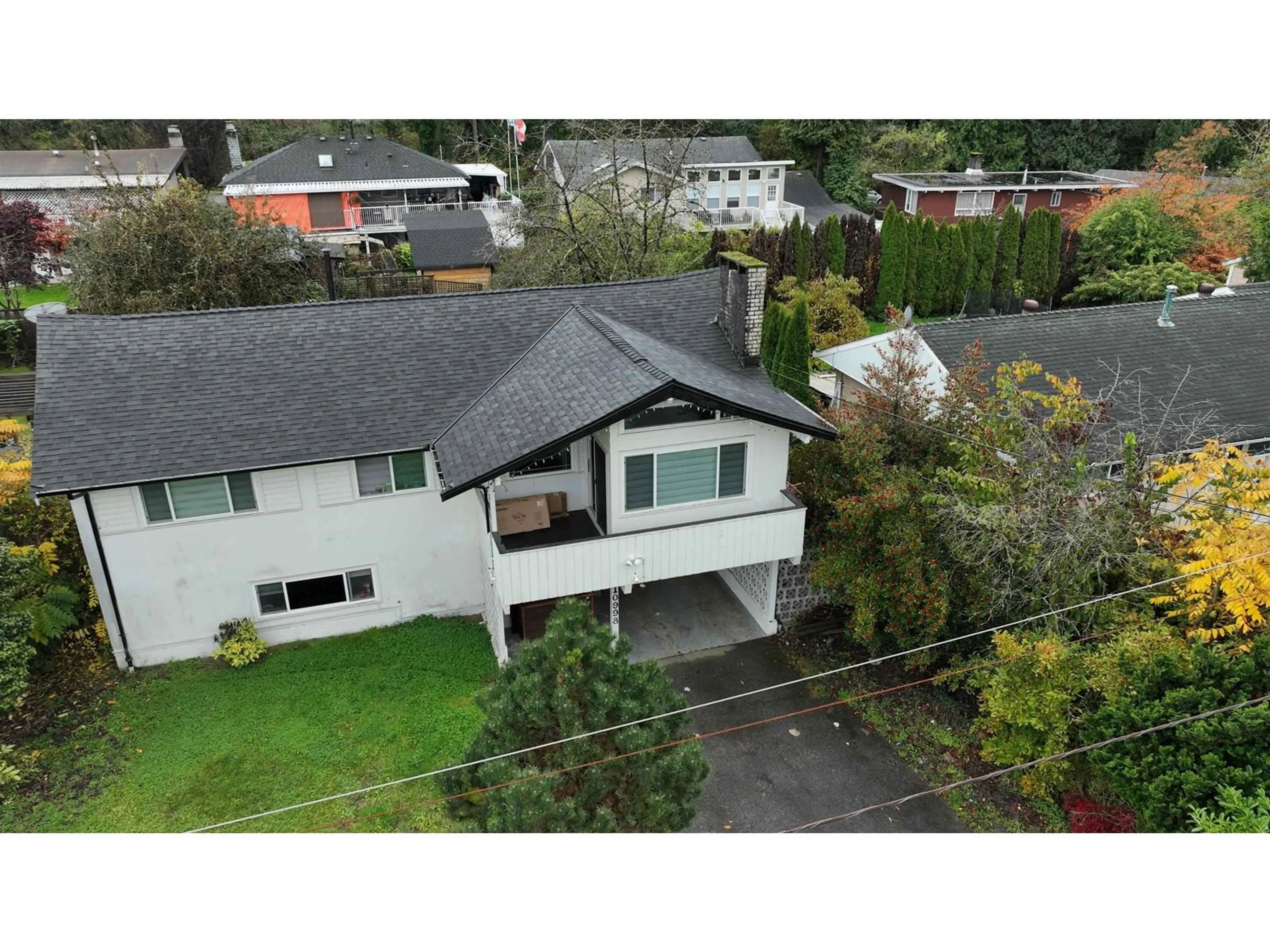 A pic from outside/outdoor area/front of a property/back of a property/a pic from drone, street for 10998 86A AVENUE, Delta British Columbia V4C2Y2