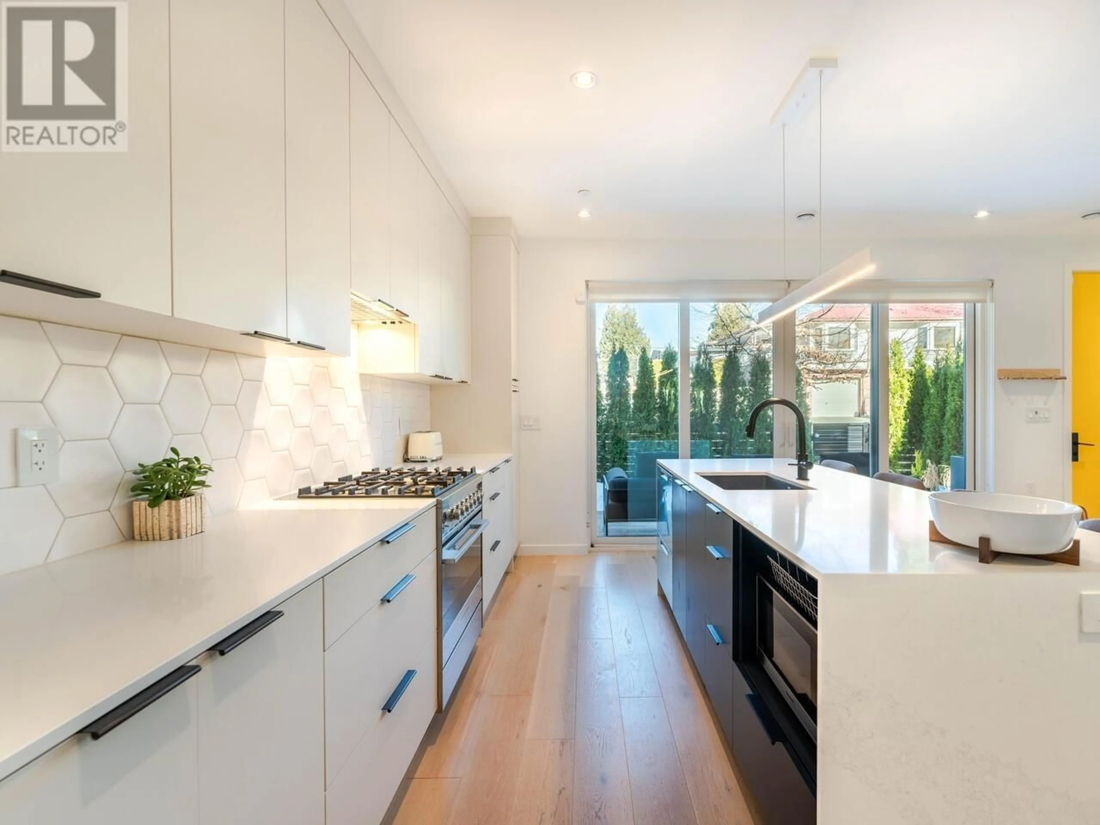 Contemporary kitchen, ceramic/tile floor for 904 E 37TH AVENUE, Vancouver British Columbia V5W1G2