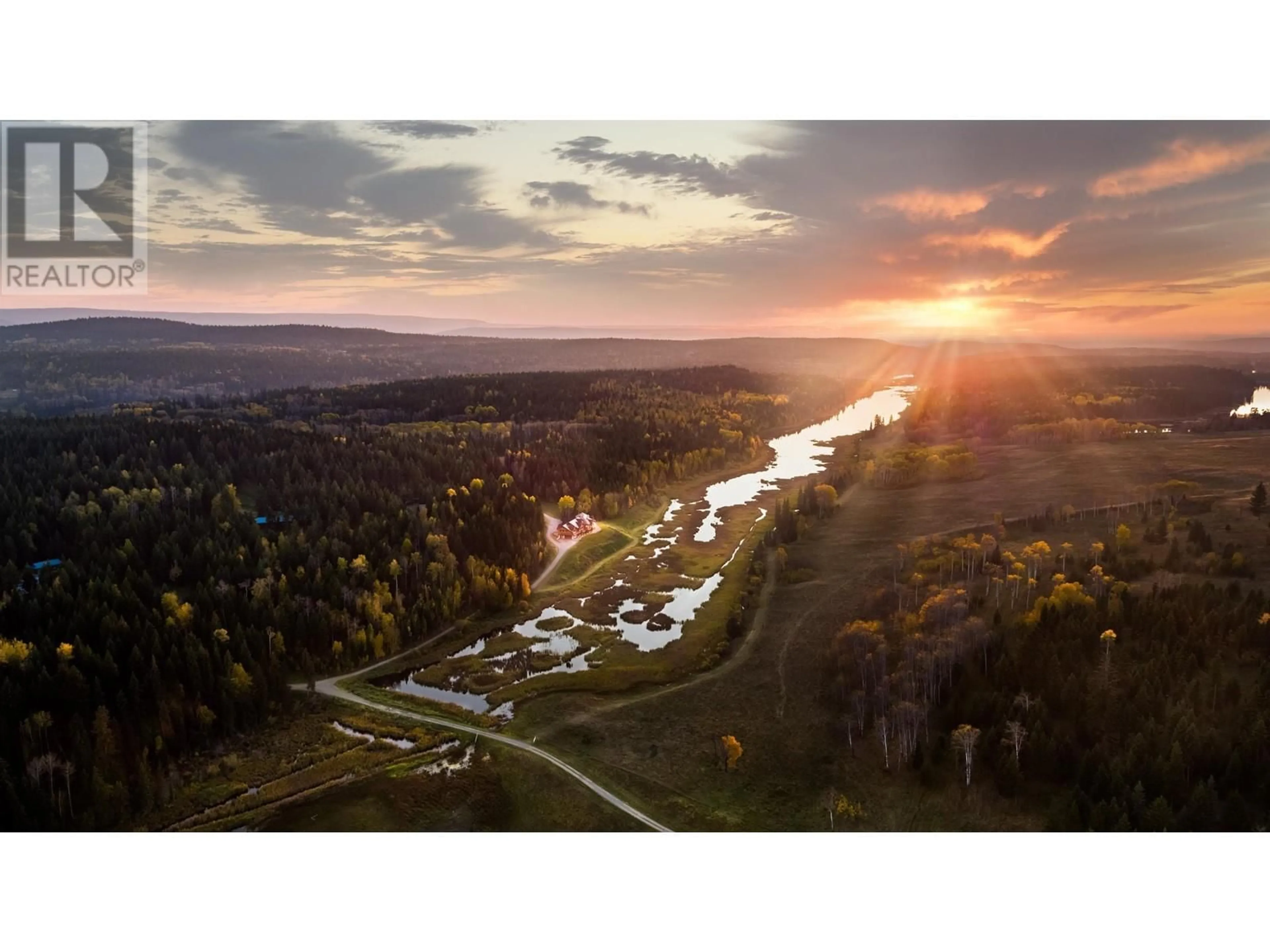 A pic from outside/outdoor area/front of a property/back of a property/a pic from drone, mountain view for 5957 THORSTEINSON ROAD, 100 Mile House British Columbia V0J1E0