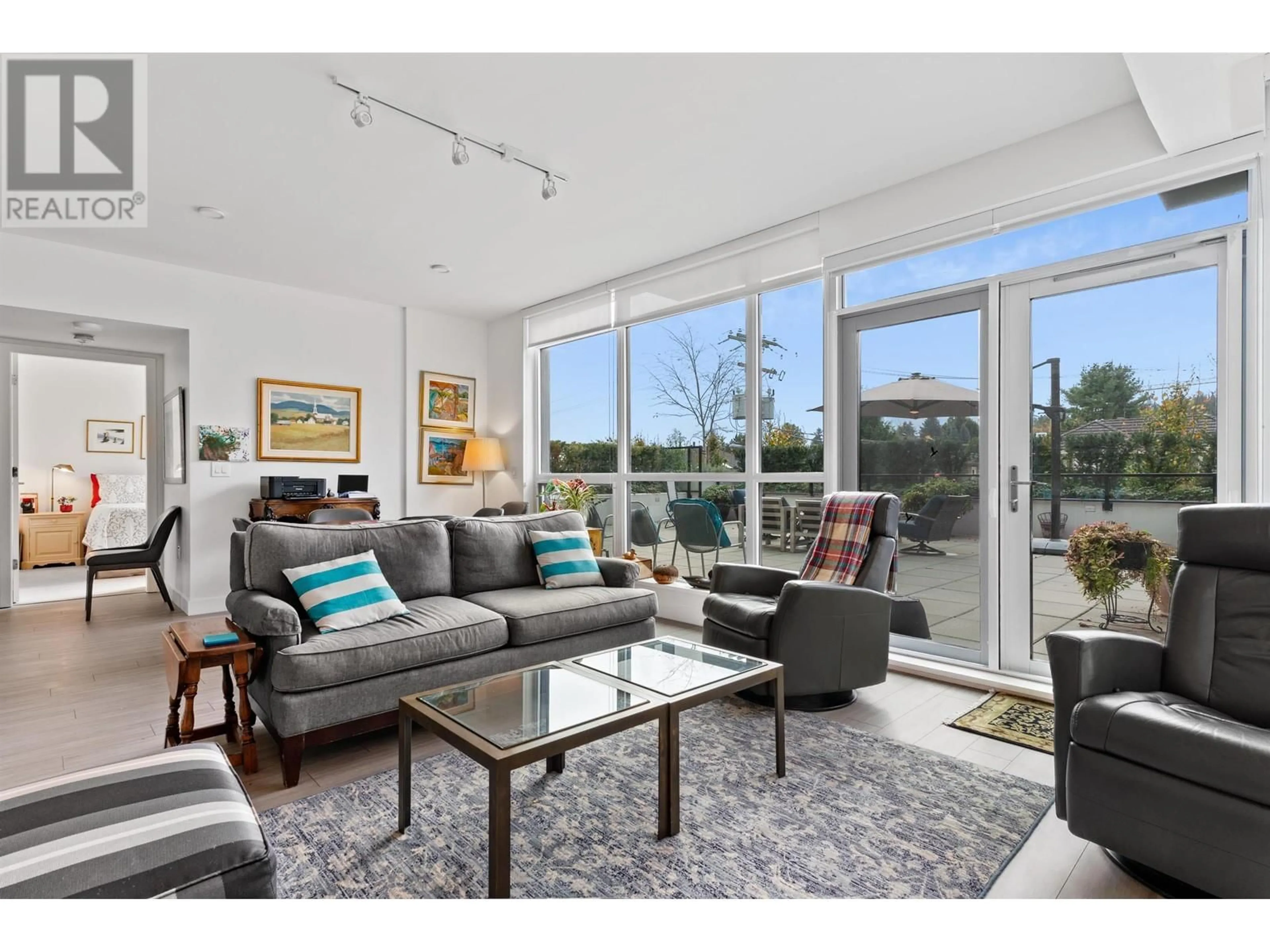 Living room with furniture, unknown for 372 - 438 KING EDWARD AVENUE, Vancouver British Columbia V5Y0M5