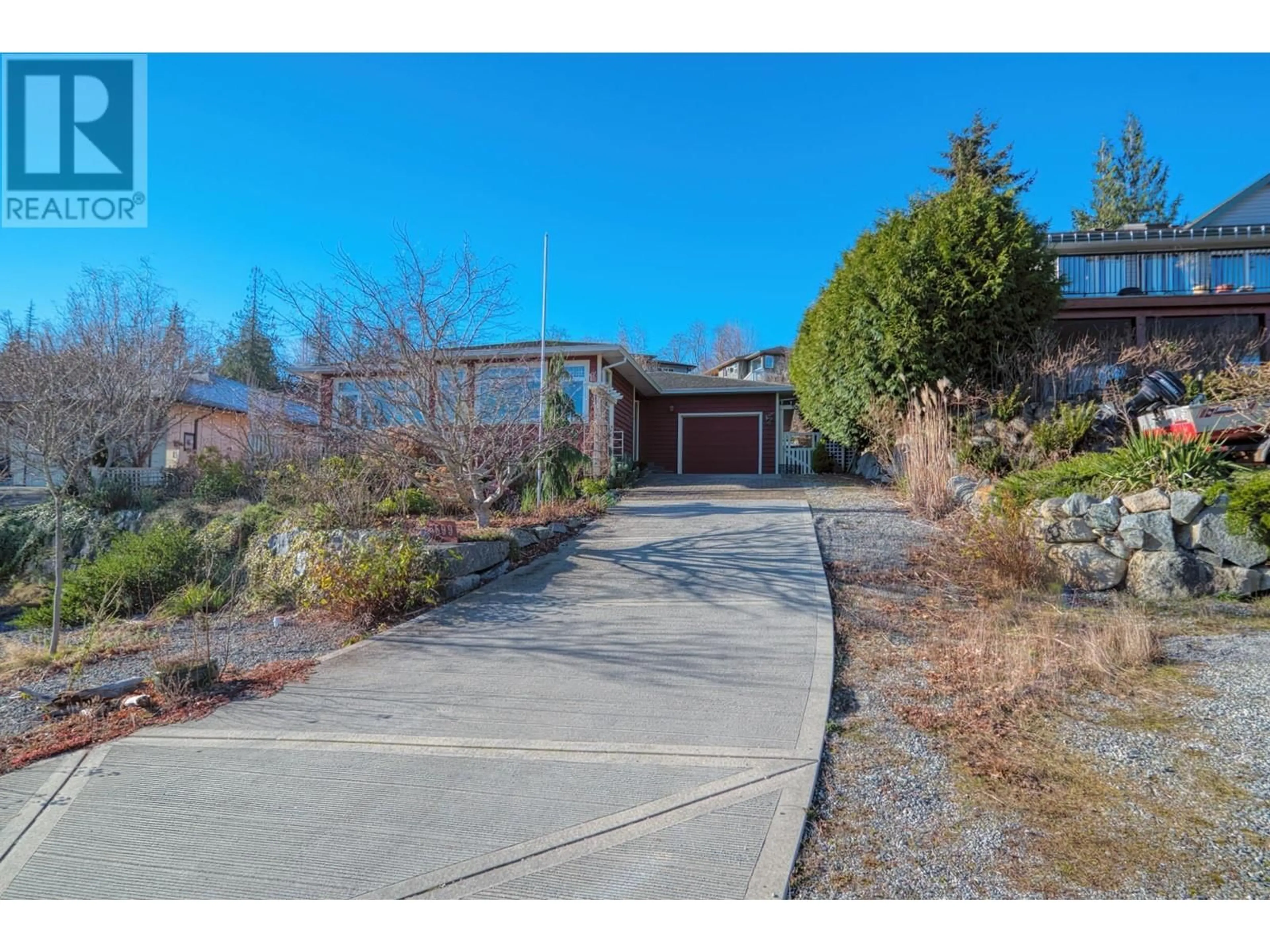 A pic from outside/outdoor area/front of a property/back of a property/a pic from drone, street for 5599 MEDUSA PLACE, Sechelt British Columbia V7Z0V1