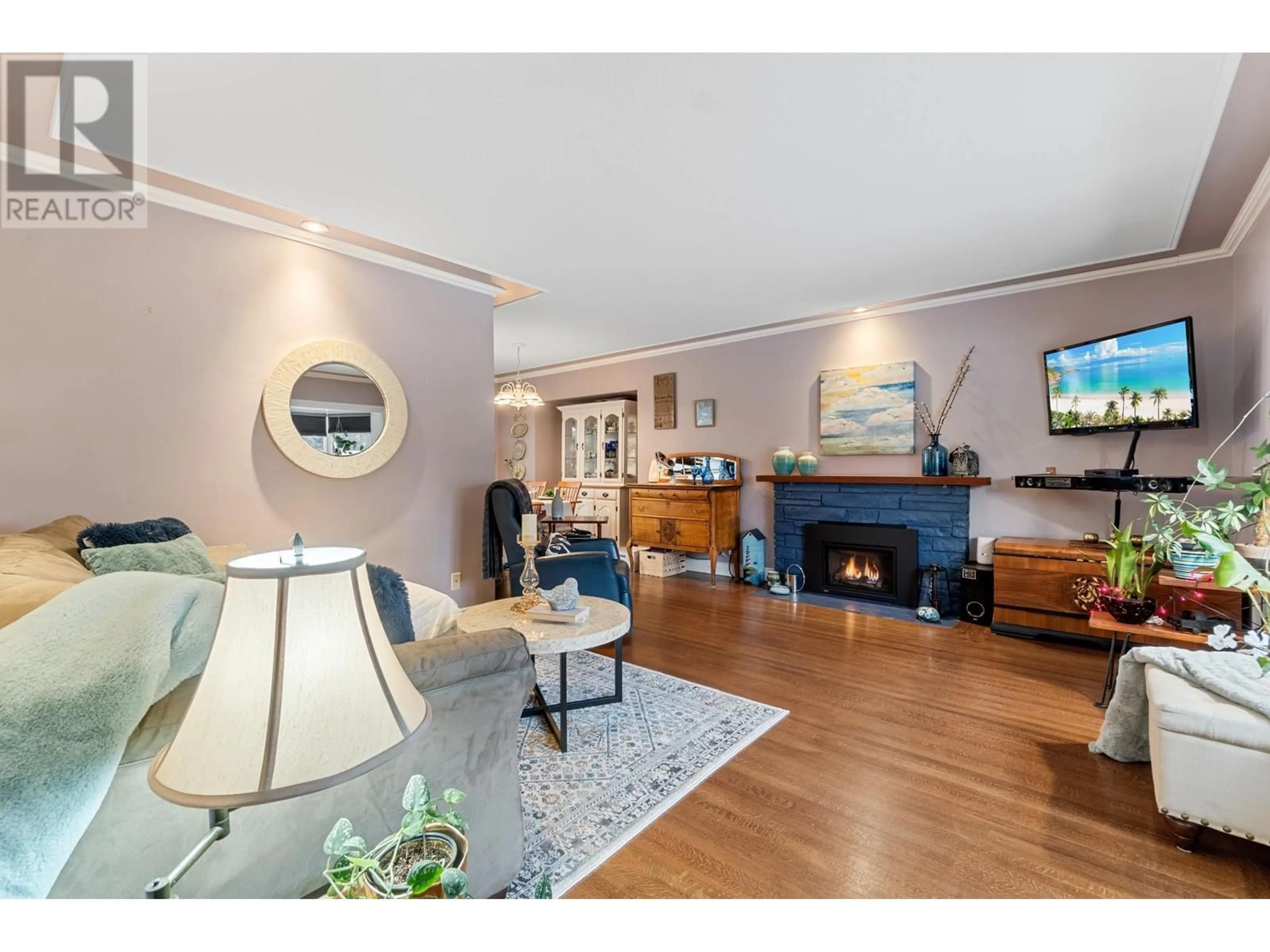 Living room with furniture, wood/laminate floor for 12100 220 STREET, Maple Ridge British Columbia V2X5R5