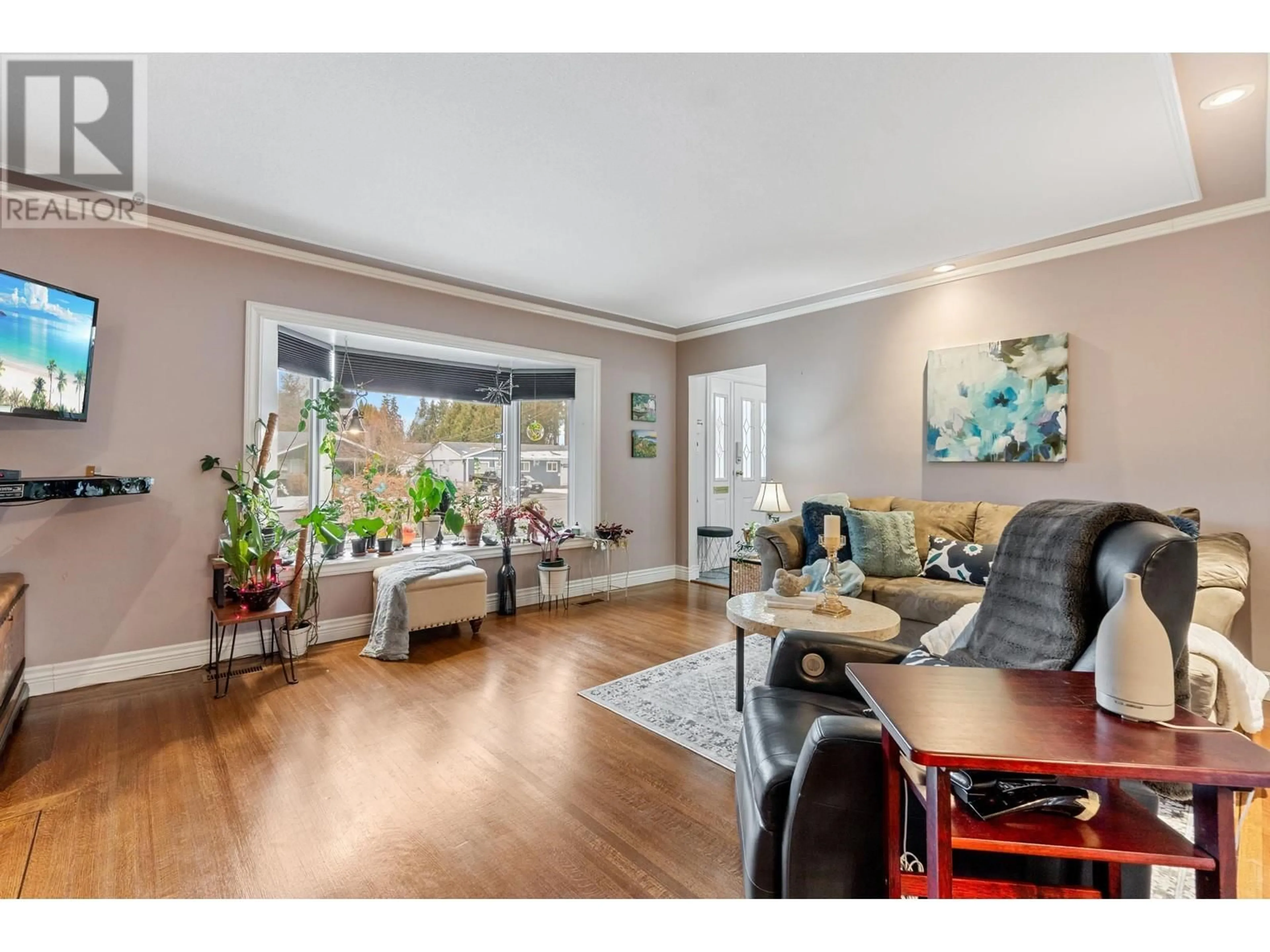 Living room with furniture, wood/laminate floor for 12100 220 STREET, Maple Ridge British Columbia V2X5R5