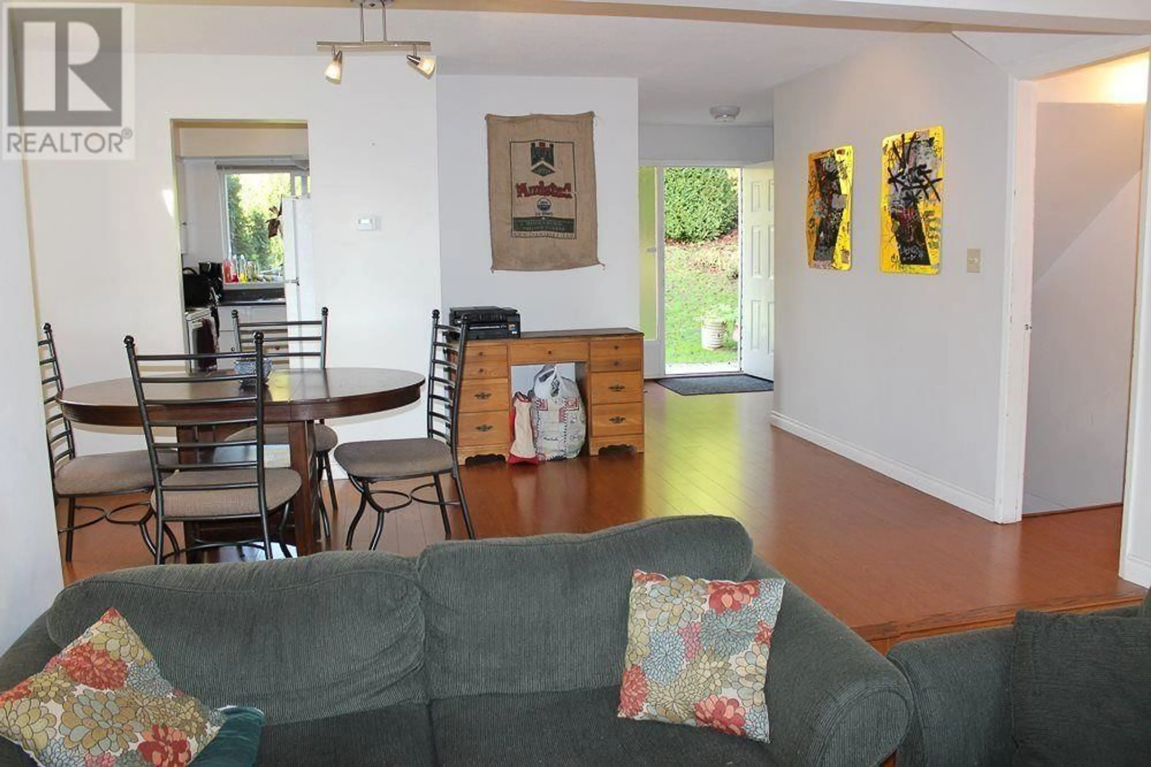 Living room with furniture, wood/laminate floor for 6762 KNEALE PLACE, Burnaby British Columbia V5B2Z2