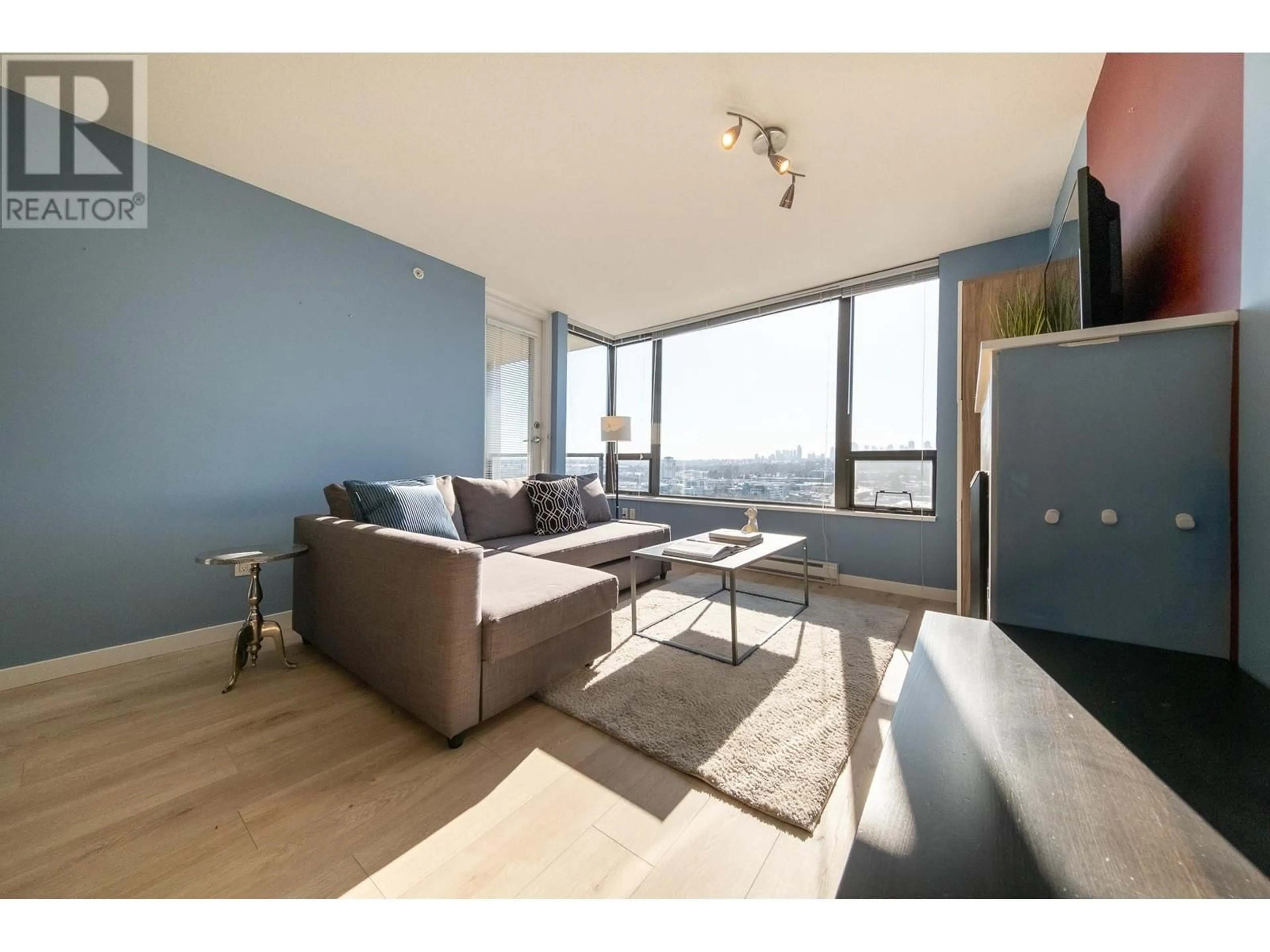 Living room with furniture, wood/laminate floor for 1907 4118 DAWSON STREET, Burnaby British Columbia V5C0A3