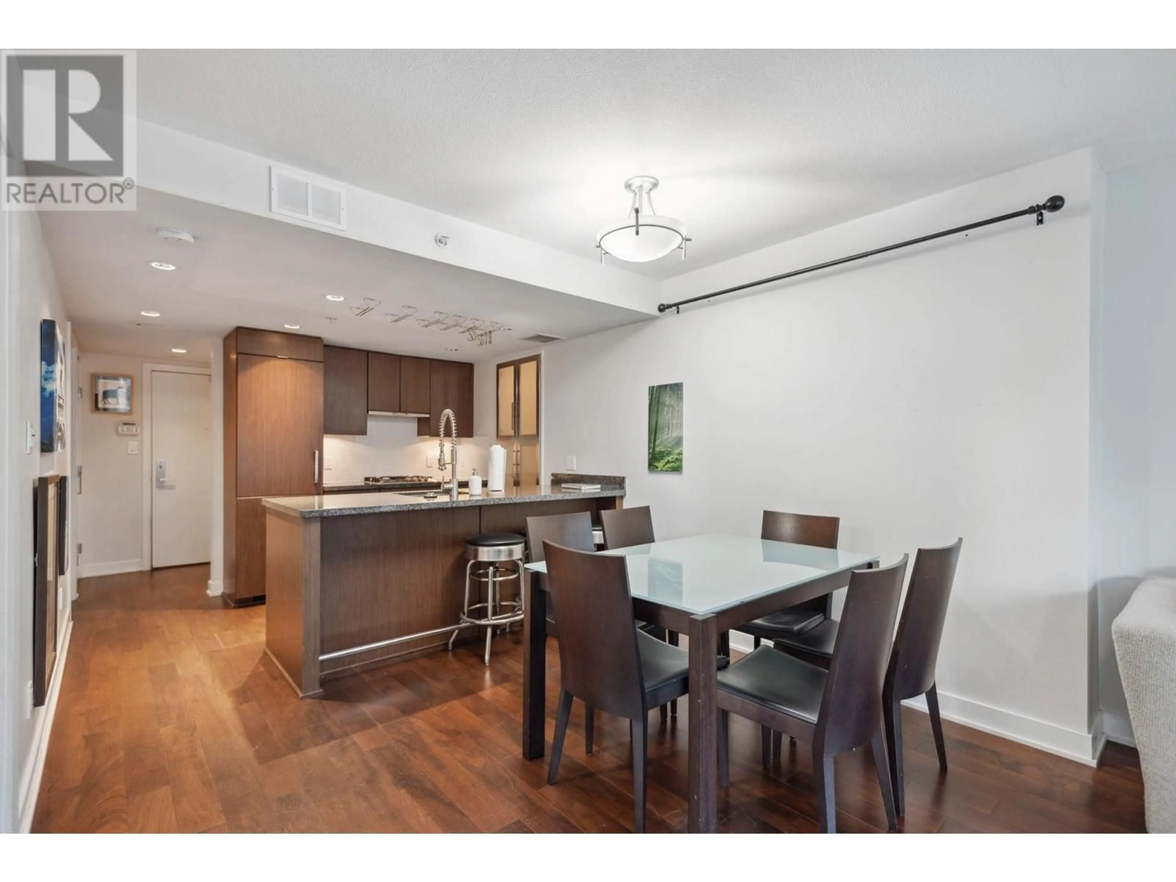 Open concept kitchen, wood/laminate floor for 609 - 1055 RICHARDS STREET, Vancouver British Columbia V6B0C2