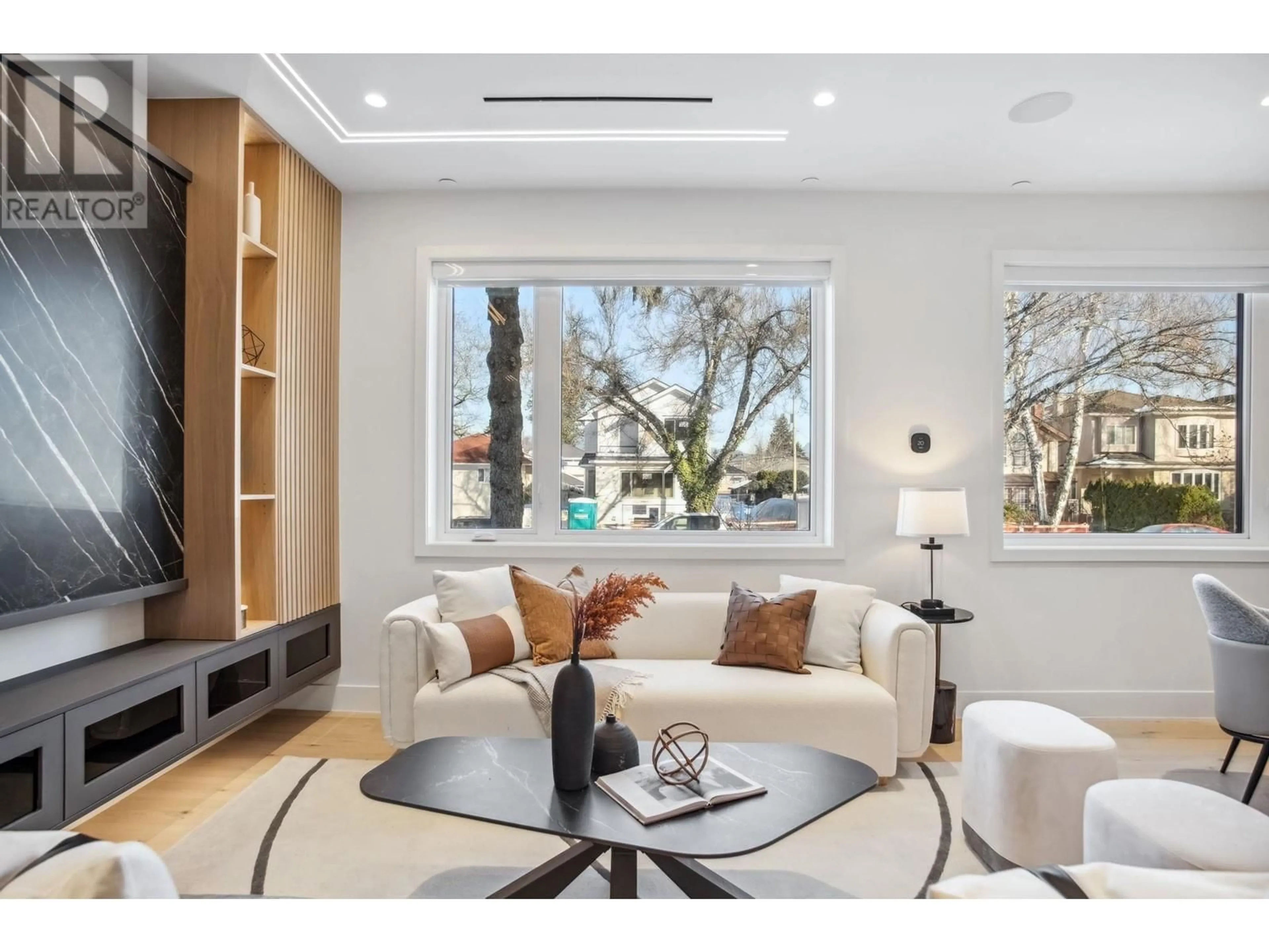 Living room with furniture, wood/laminate floor for 2792 W 21ST AVENUE, Vancouver British Columbia V6L1K3