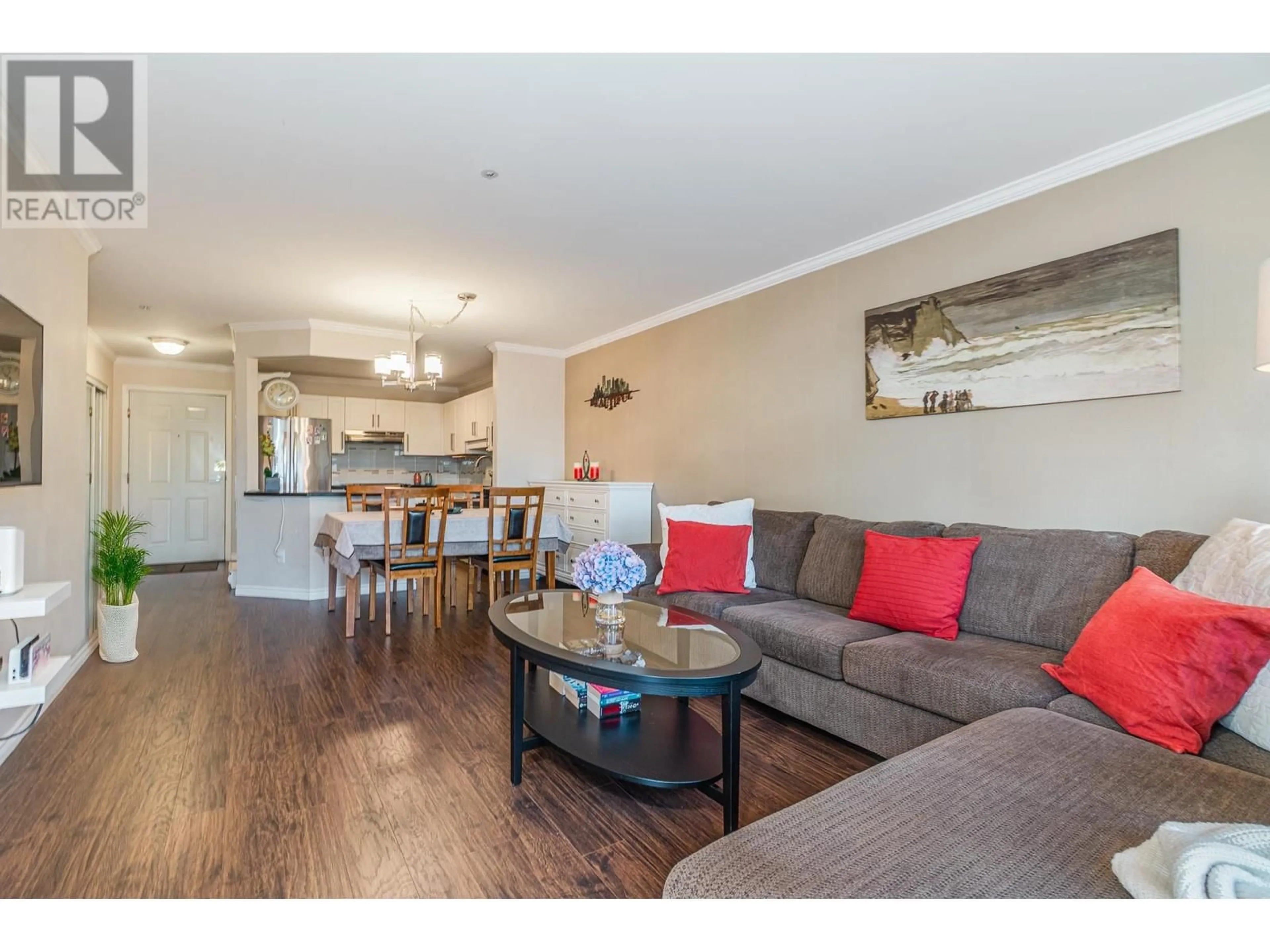 Living room with furniture, wood/laminate floor for 207 888 GAUTHIER AVENUE, Coquitlam British Columbia V3K6Y1