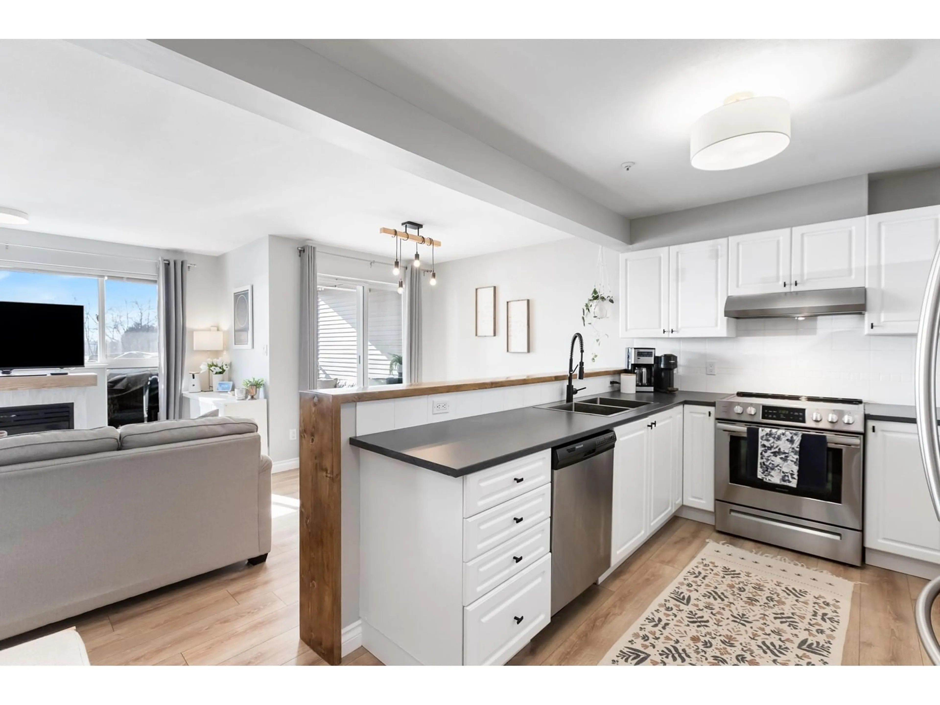 Open concept kitchen, unknown for 308 6390 196 STREET, Langley British Columbia V2Y1J2