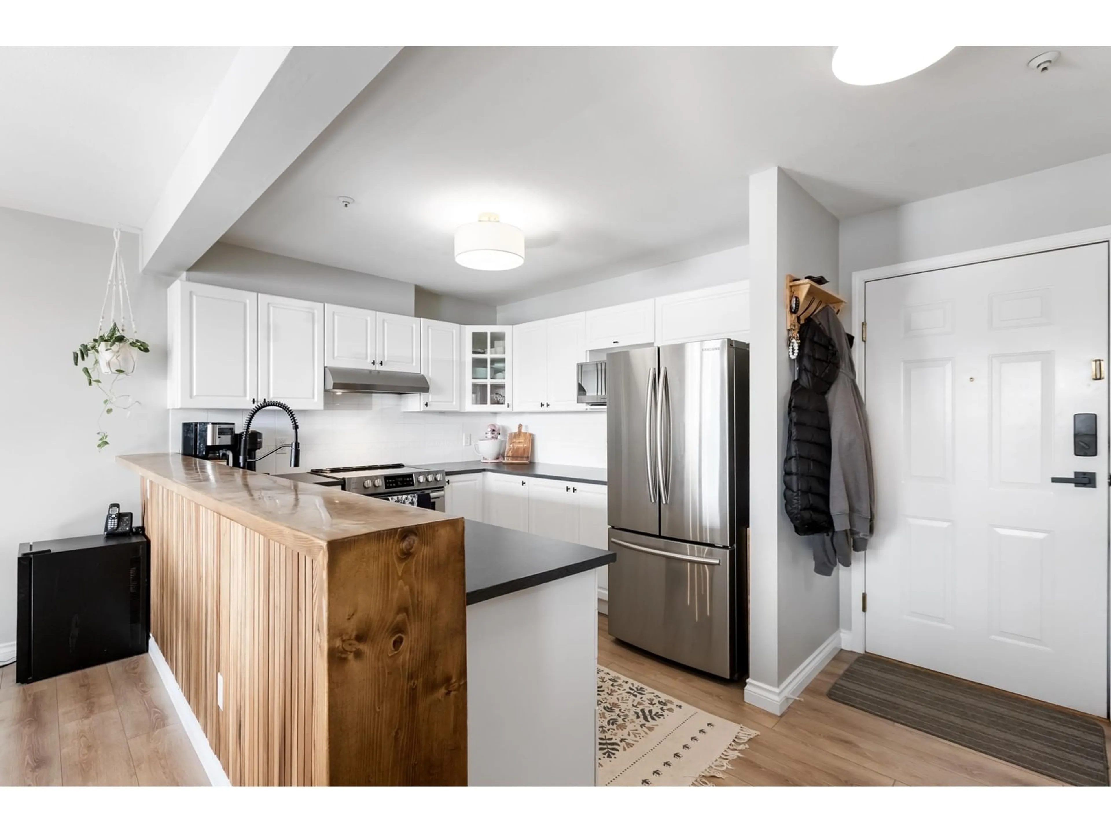 Open concept kitchen, unknown for 308 6390 196 STREET, Langley British Columbia V2Y1J2