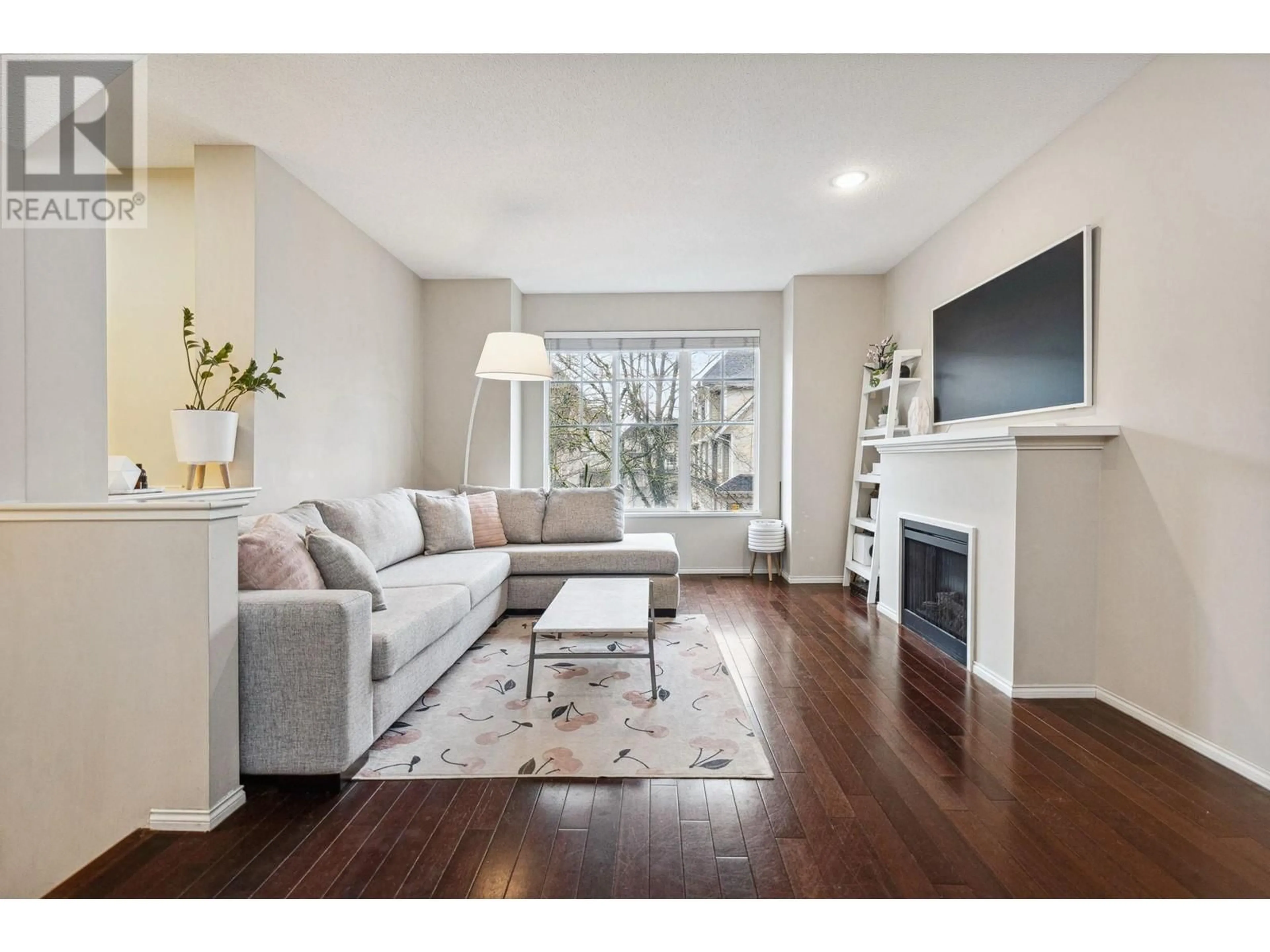 Living room with furniture, wood/laminate floor for 45 7233 HEATHER STREET, Richmond British Columbia V6Y4J8