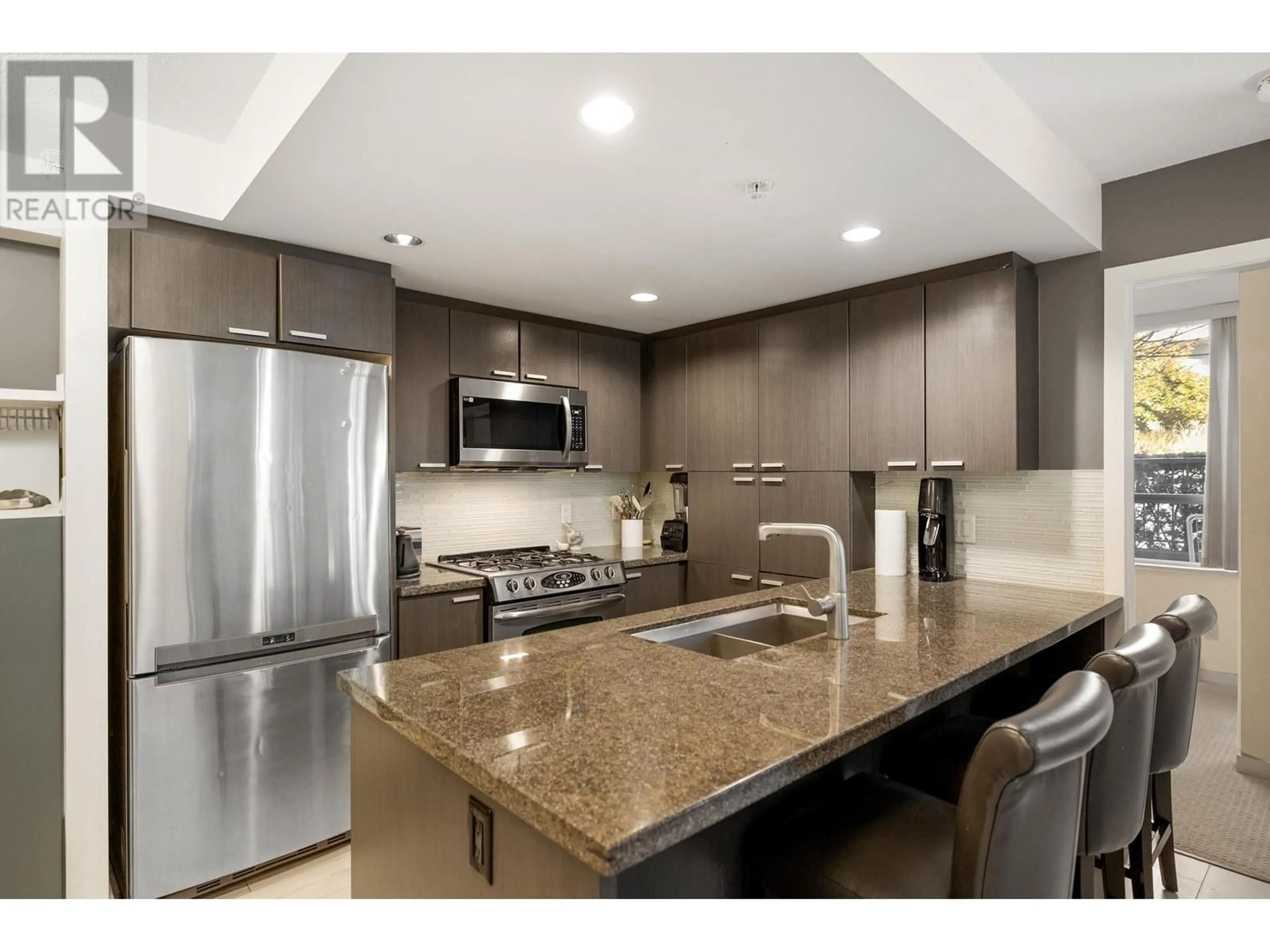 Open concept kitchen, ceramic/tile floor for 302 2200 DOUGLAS ROAD, Burnaby British Columbia V5C0G8