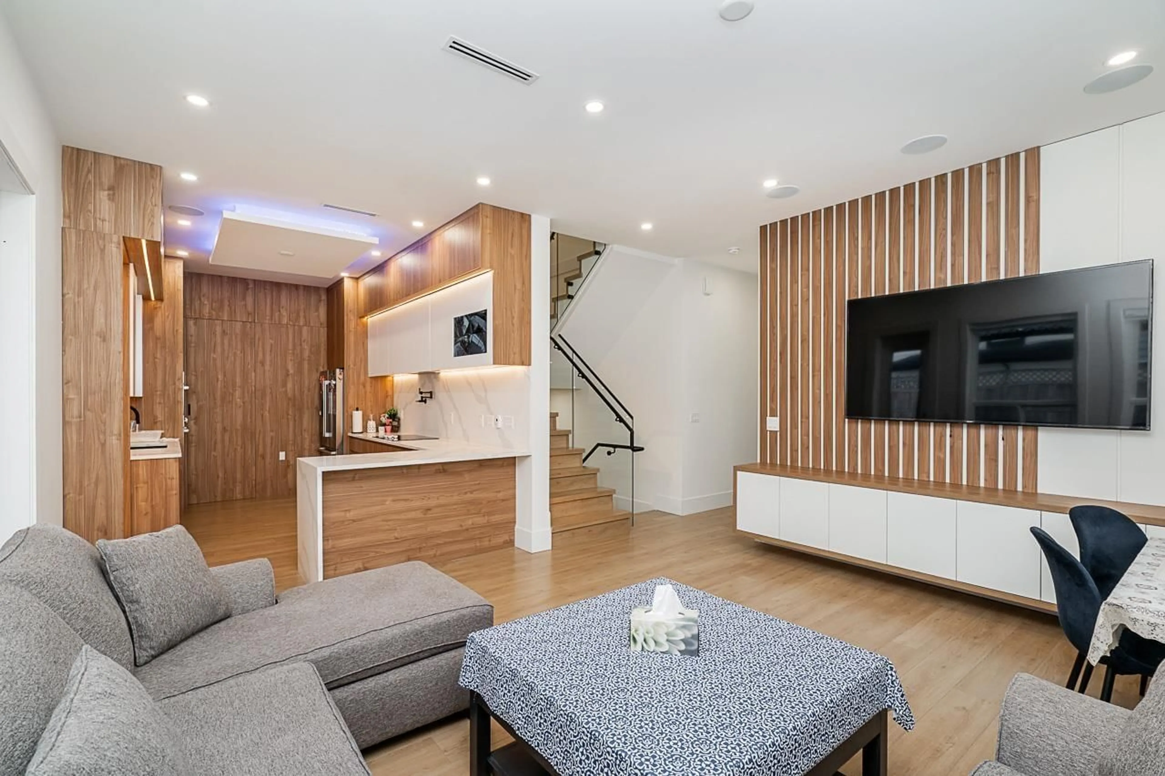 Living room with furniture, wood/laminate floor for 13098 112A AVENUE, Surrey British Columbia V3T2S8