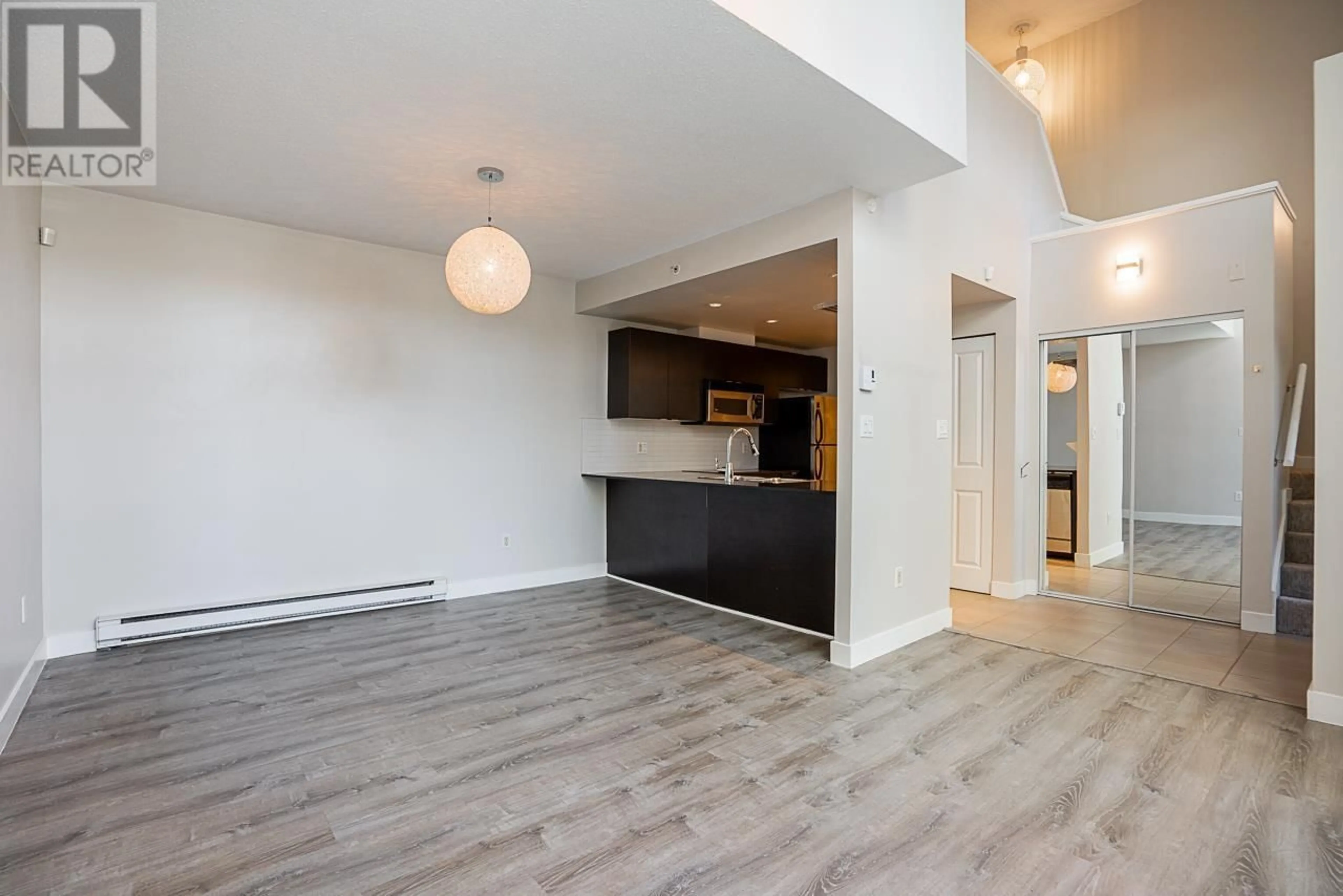 Open concept kitchen, wood/laminate floor for 11 4178 DAWSON STREET, Burnaby British Columbia V5C0A1
