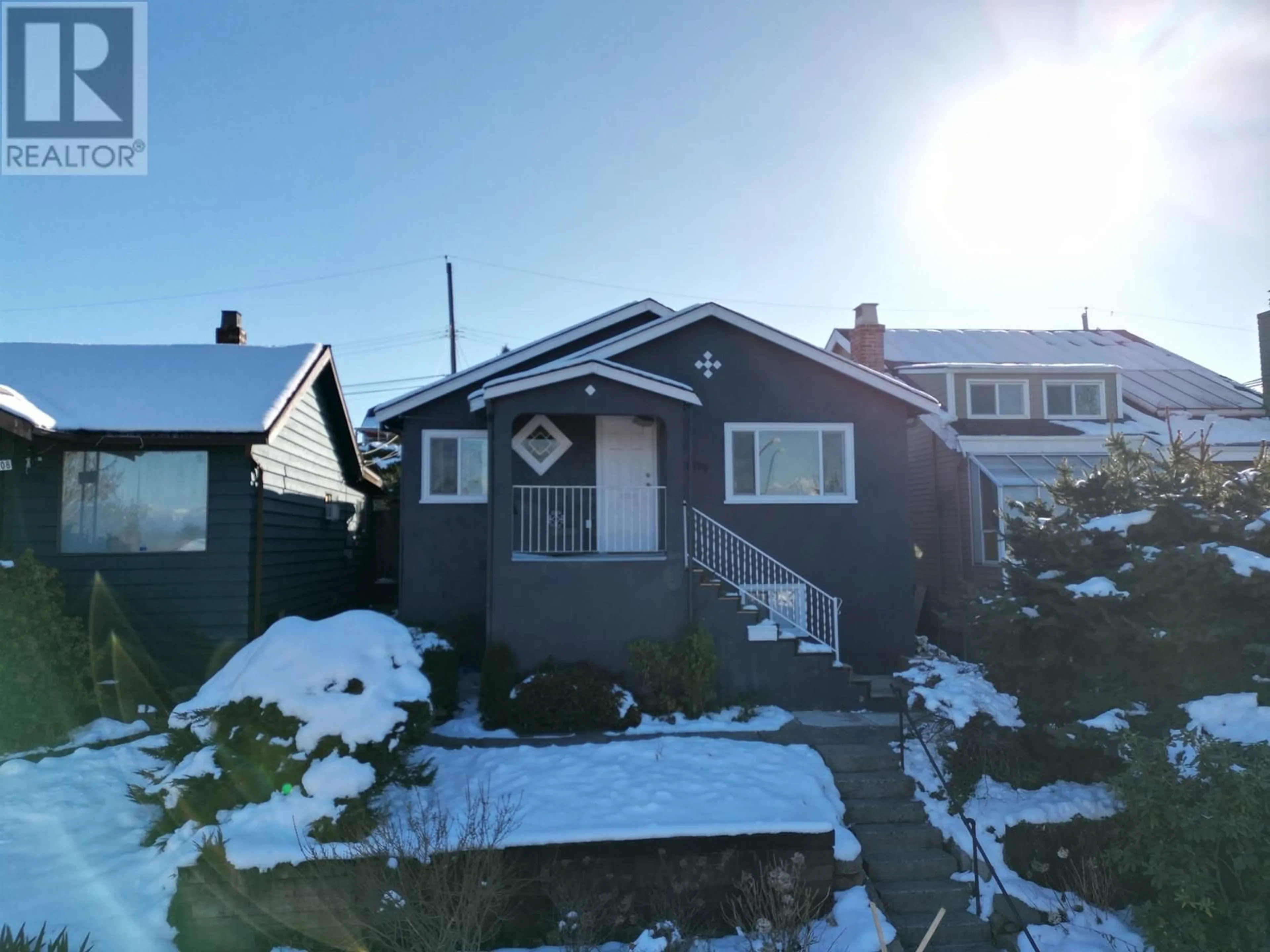 A pic from outside/outdoor area/front of a property/back of a property/a pic from drone, street for 1596 E 33RD AVENUE, Vancouver British Columbia V5N3C8