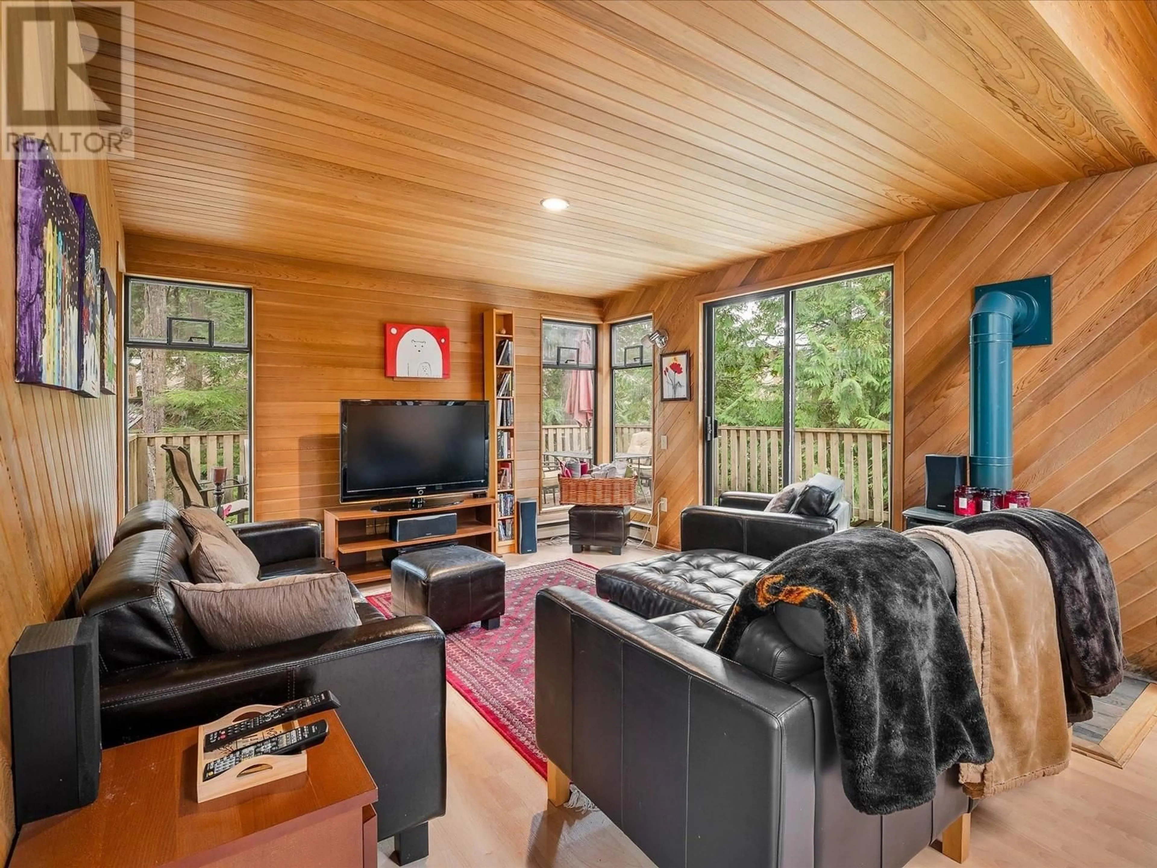 Living room with furniture, wood/laminate floor for 9440 DEERHORN PLACE, Whistler British Columbia V8E0G5