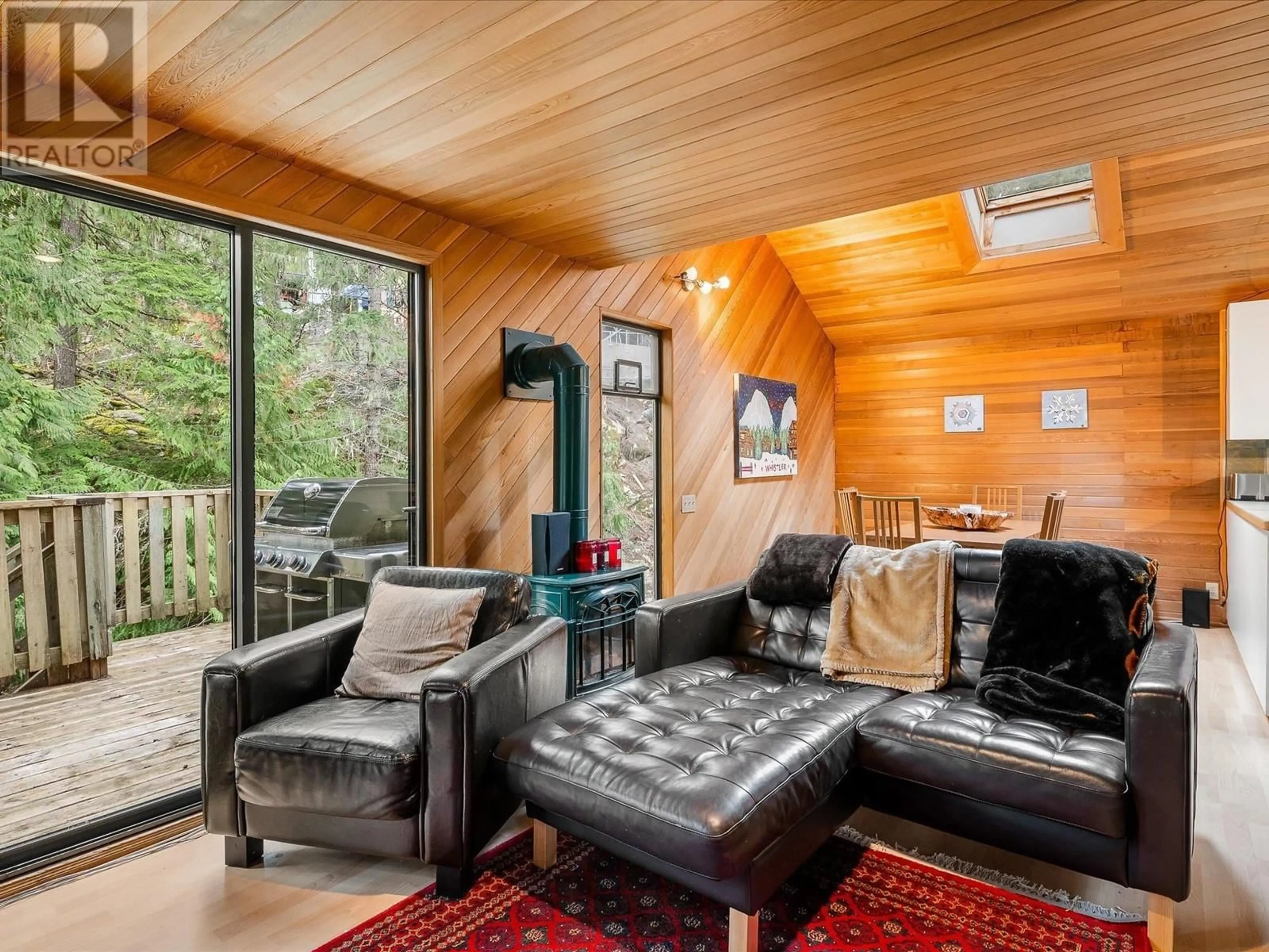 Living room with furniture, wood/laminate floor for 9440 DEERHORN PLACE, Whistler British Columbia V8E0G5