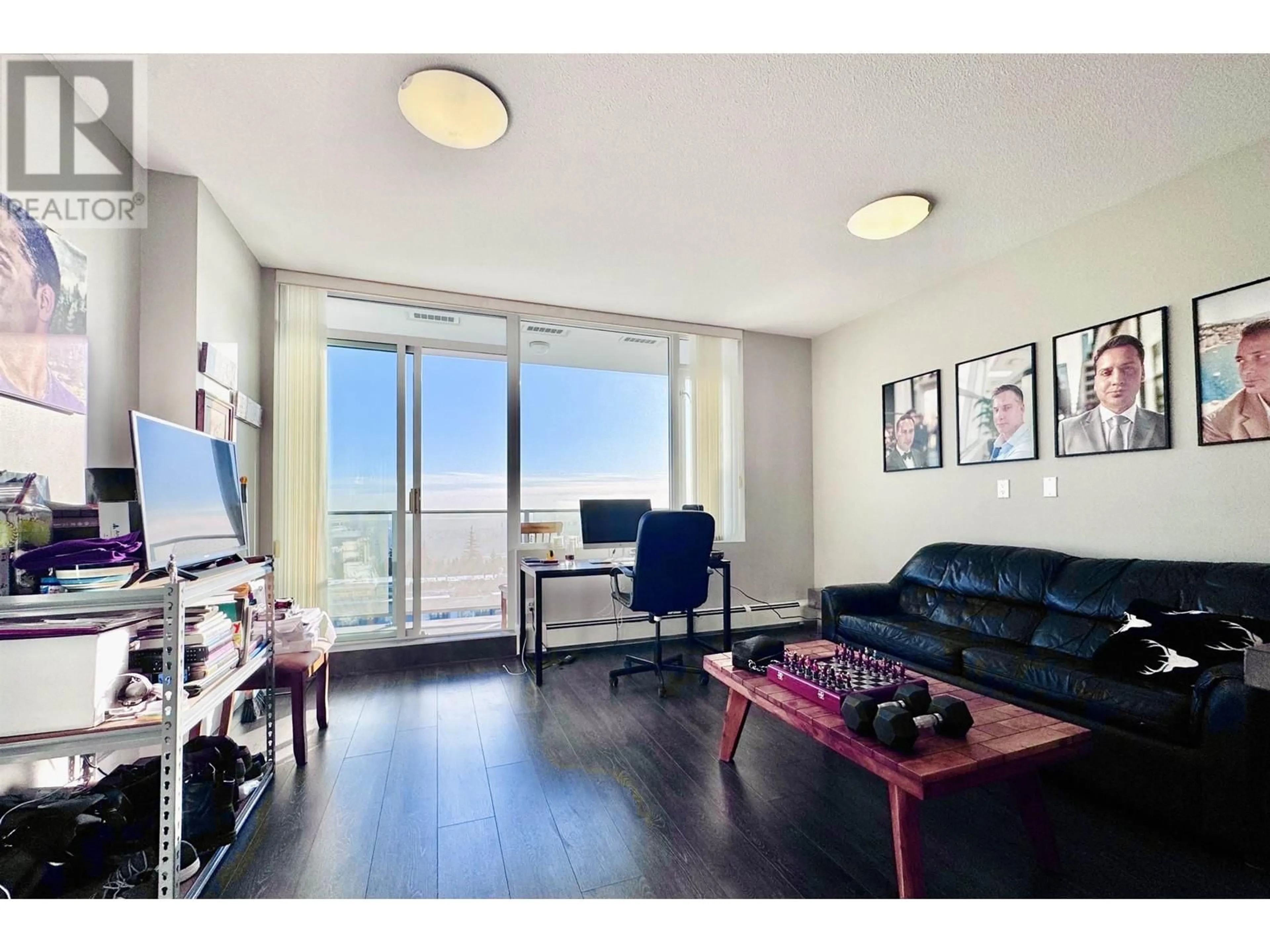 Living room with furniture, wood/laminate floor for 1103 - 9025 HIGHLAND COURT, Burnaby British Columbia V5A0A8