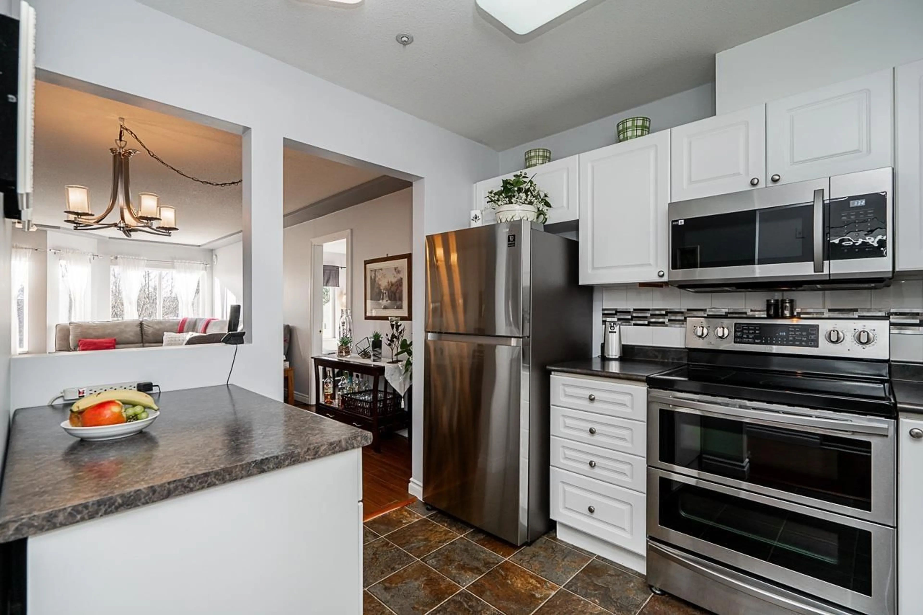 Open concept kitchen, unknown for 401 20443 53 AVENUE, Langley British Columbia V3A7A6