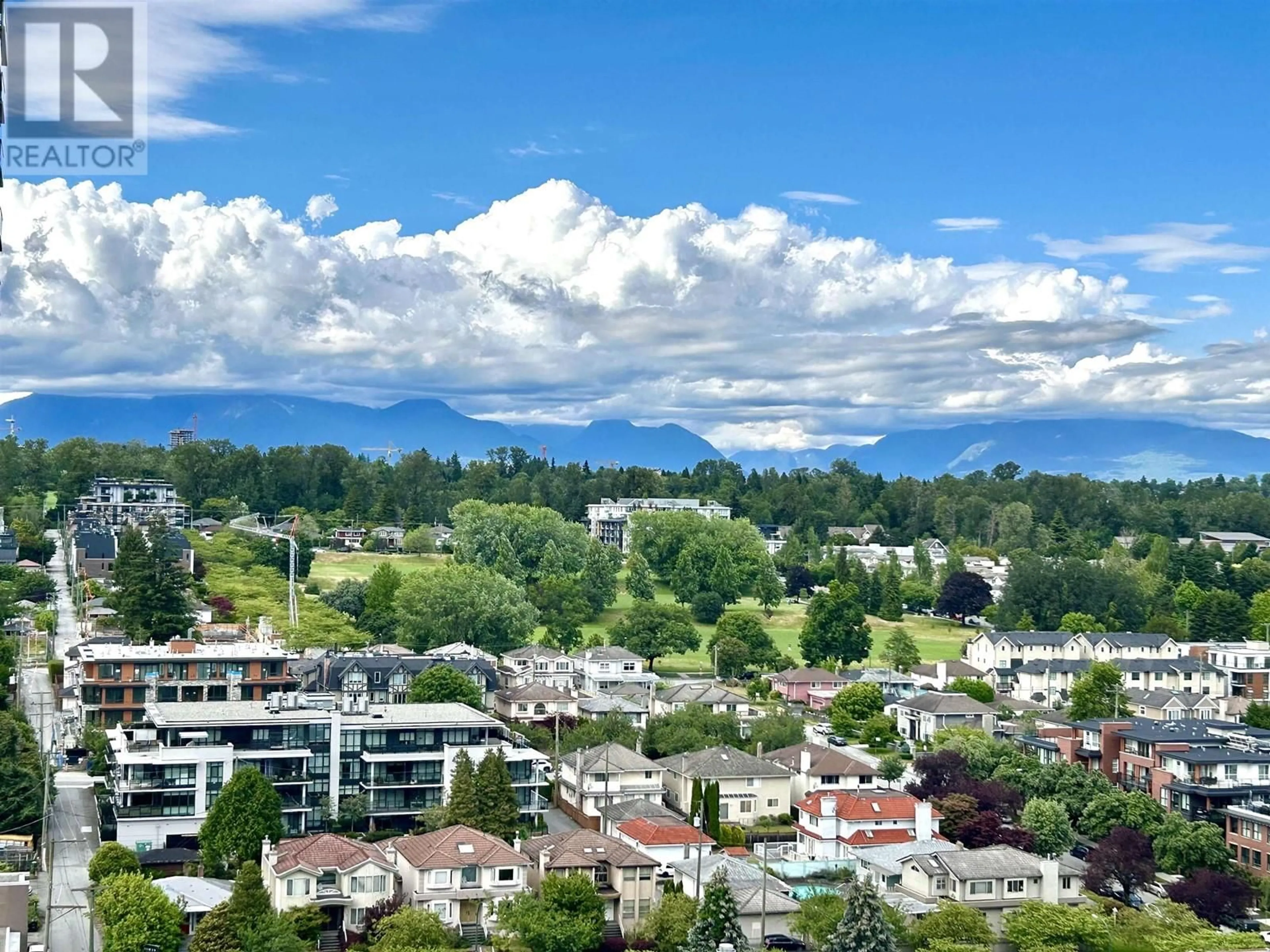 A pic from outside/outdoor area/front of a property/back of a property/a pic from drone, mountain view for 1804 8131 NUNAVUT LANE, Vancouver British Columbia V5X0E2