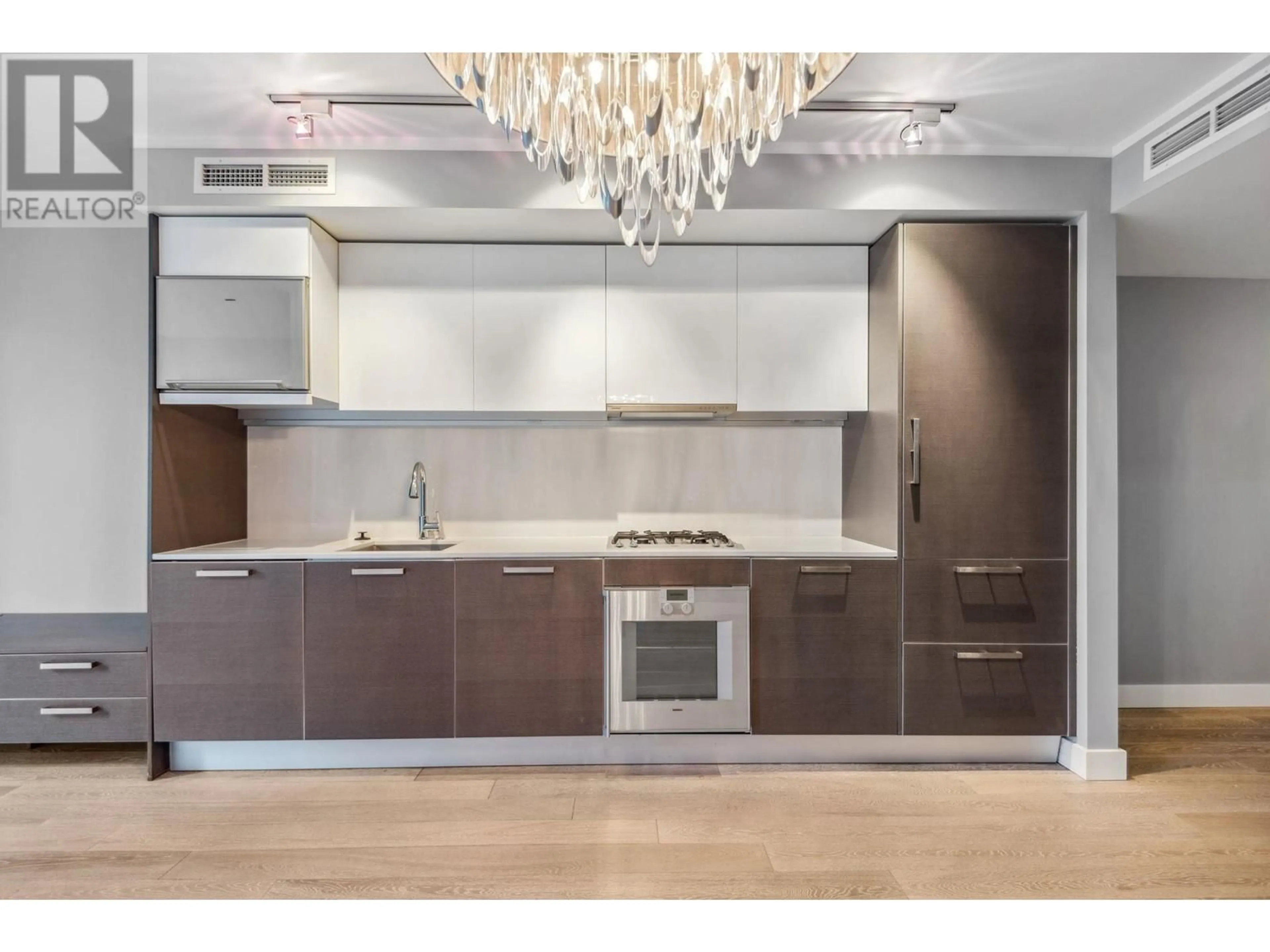 Open concept kitchen, wood/laminate floor for PH505 - 1477 PENDER STREET, Vancouver British Columbia V6G2S3