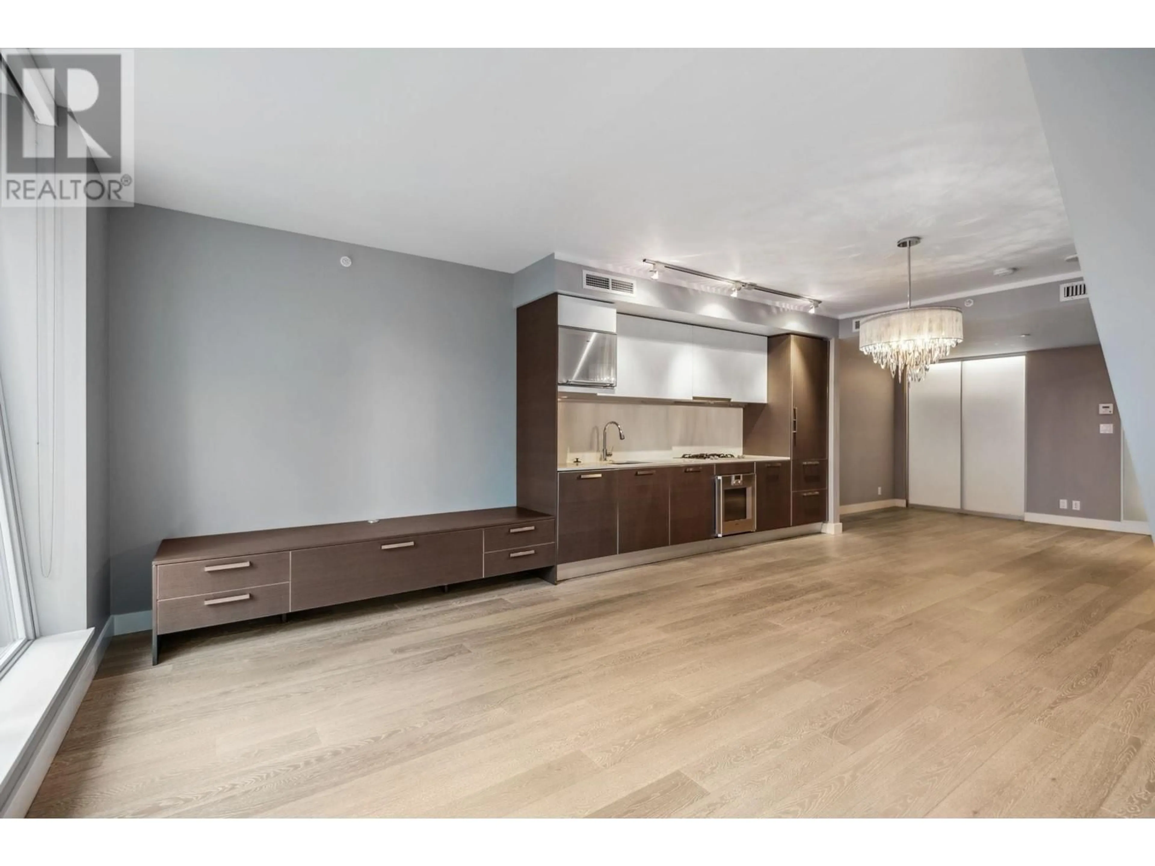 Open concept kitchen, wood/laminate floor for PH505 - 1477 PENDER STREET, Vancouver British Columbia V6G2S3